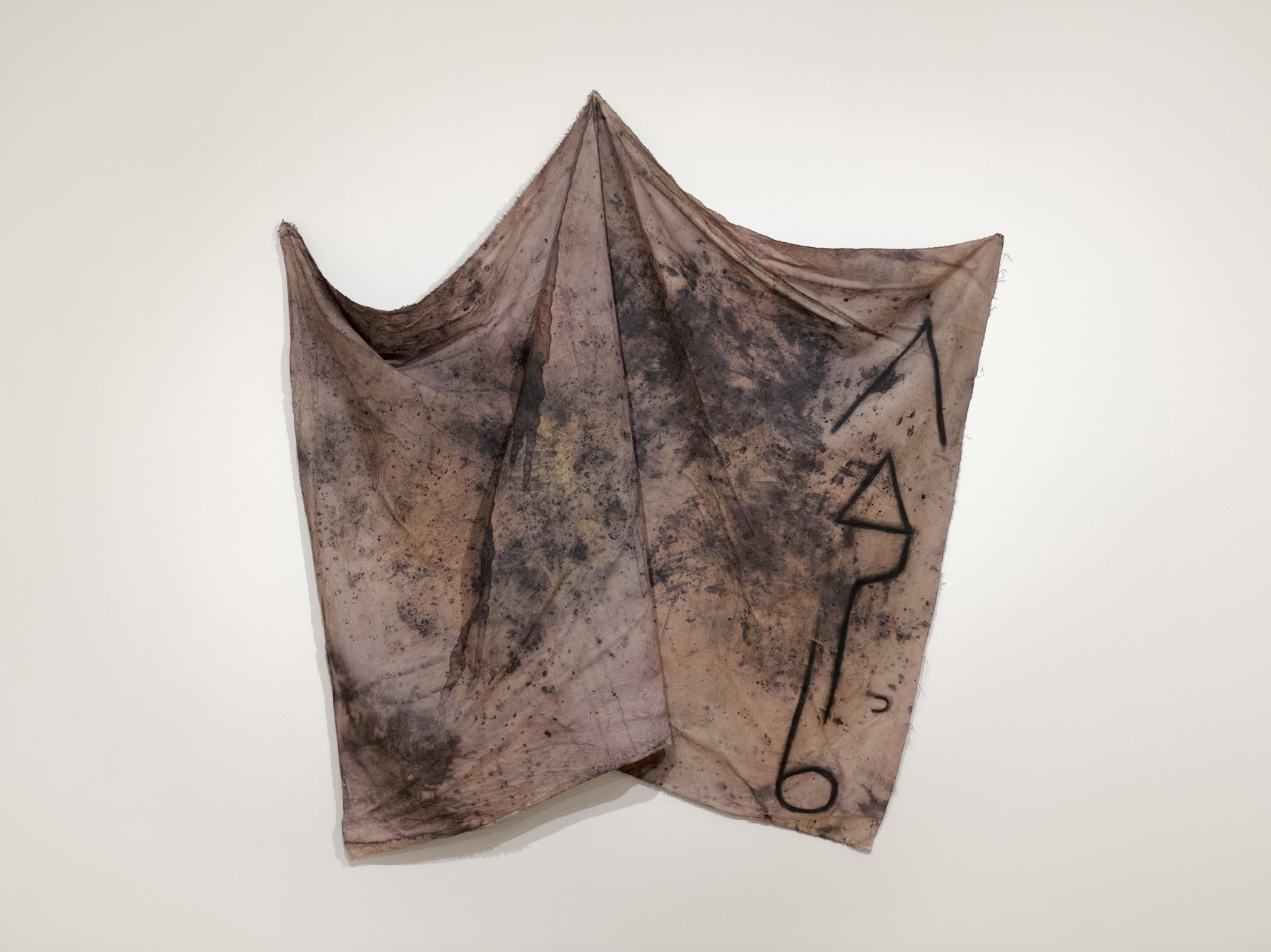 a piece of textile on the wall