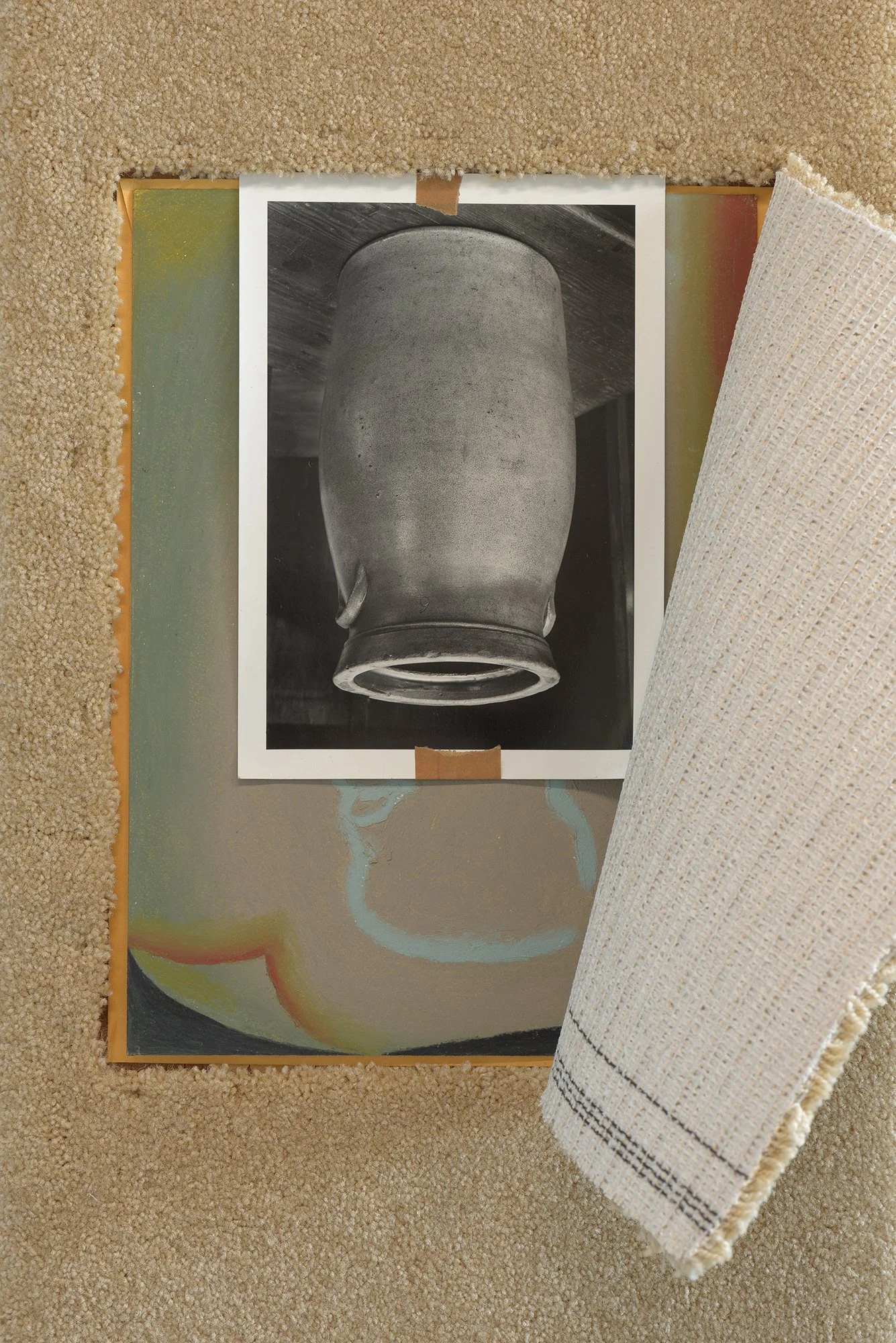 two images shown through an opening of a carpet