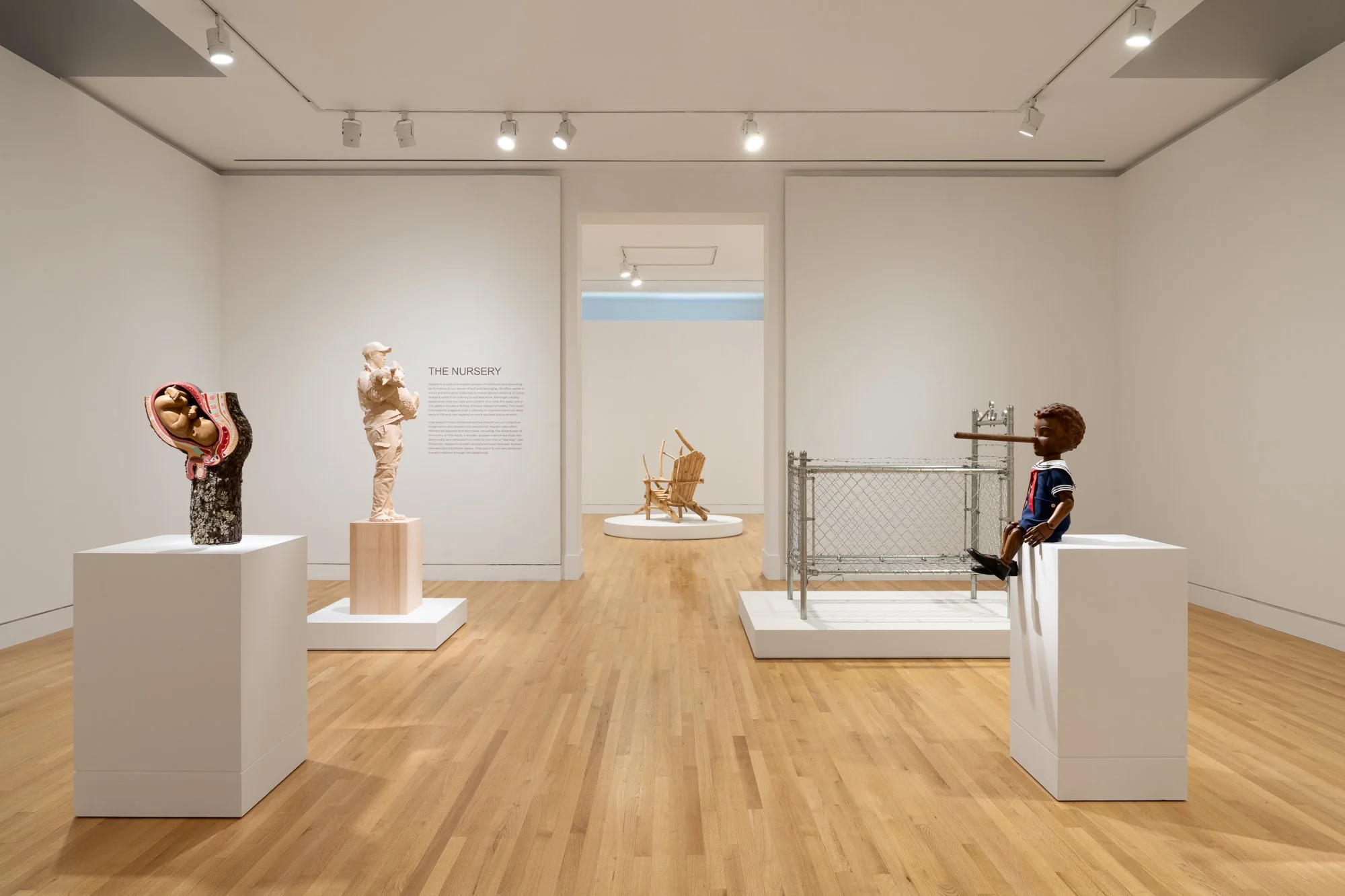 various sculptures in a gallery