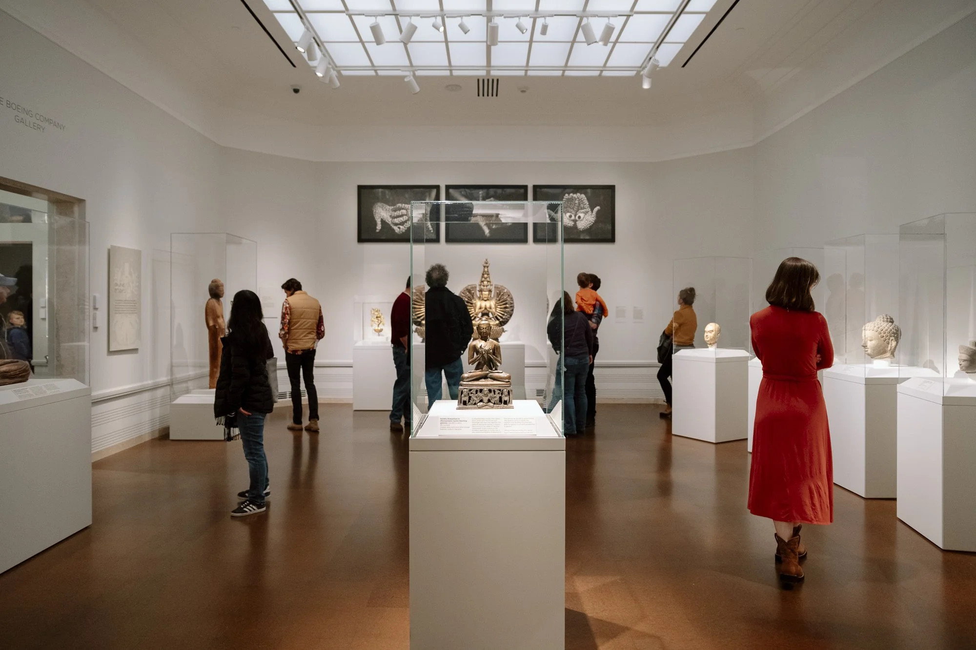 people looking at art in a gallery