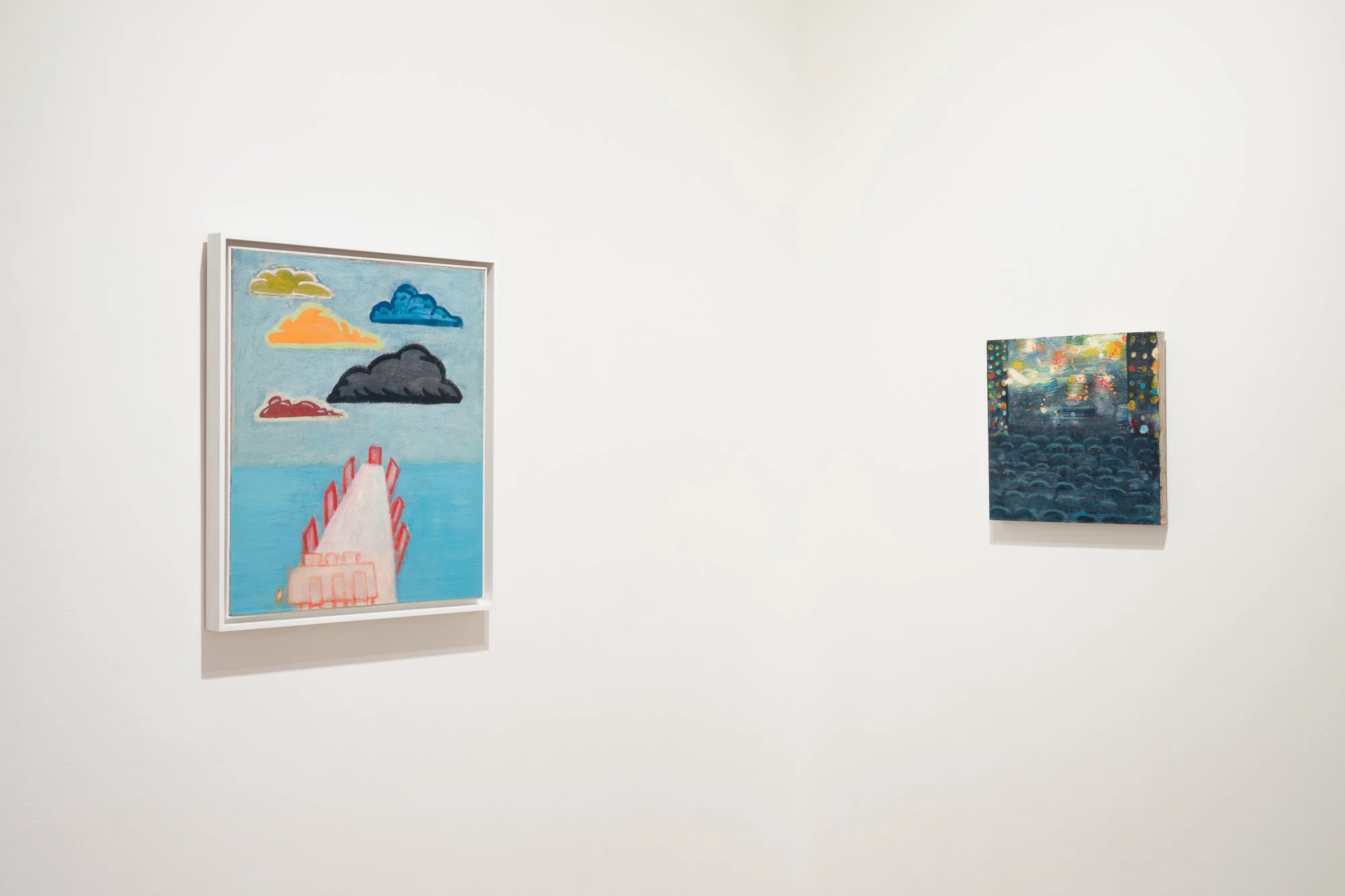 two small paintings on the walls