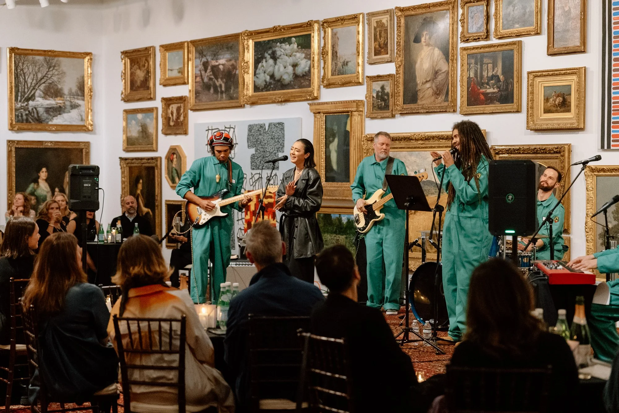 a band playing on stage in a salon