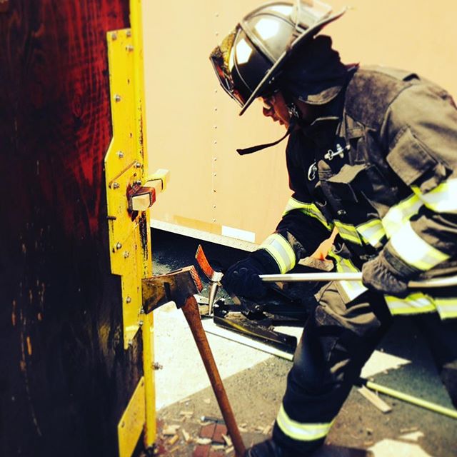 Firefighter Forcing Entry on Catalyst Force Entry Door