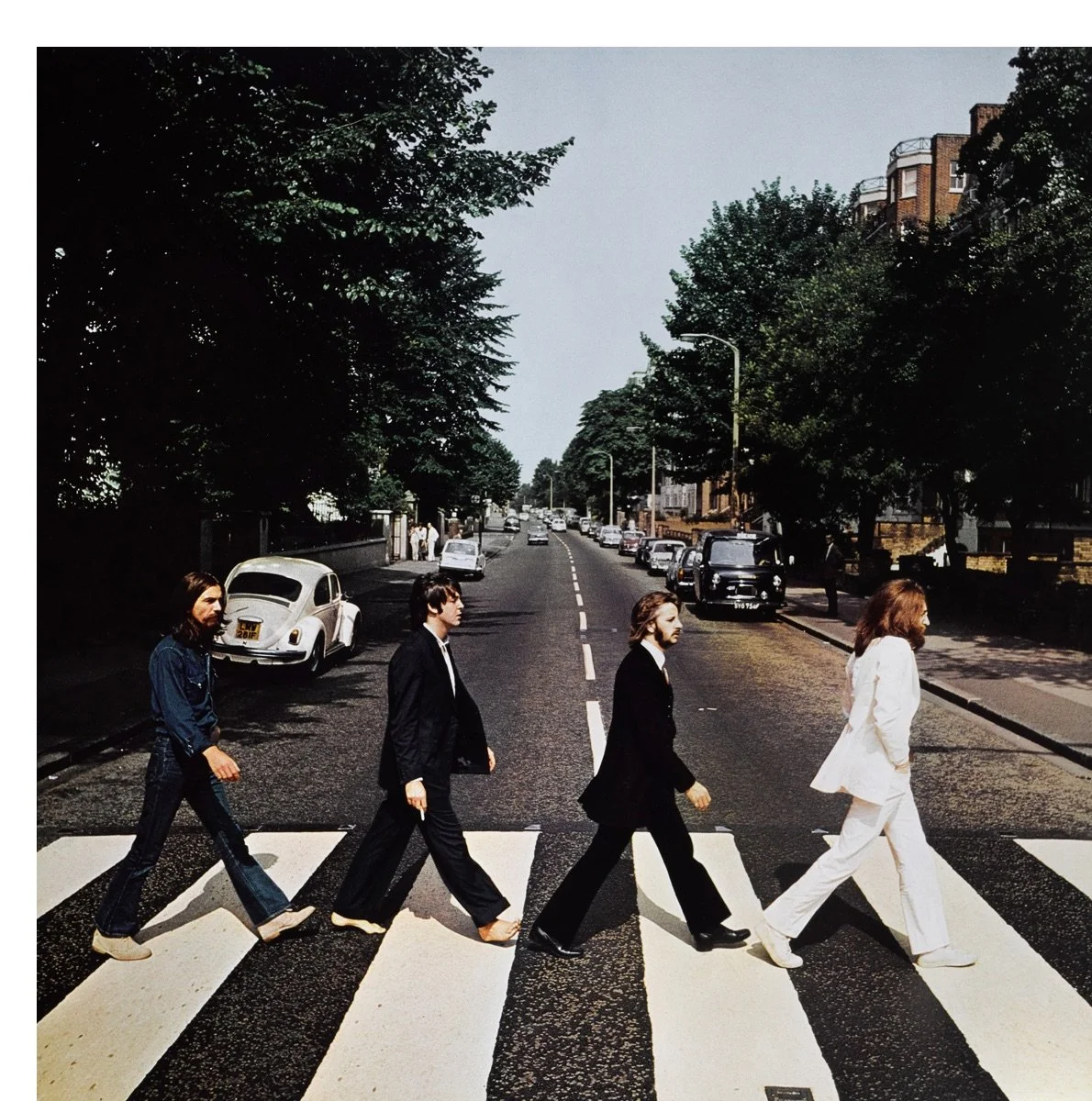 THE BEATLES CROSSING ABBEY ROAD by Iain Macmillan