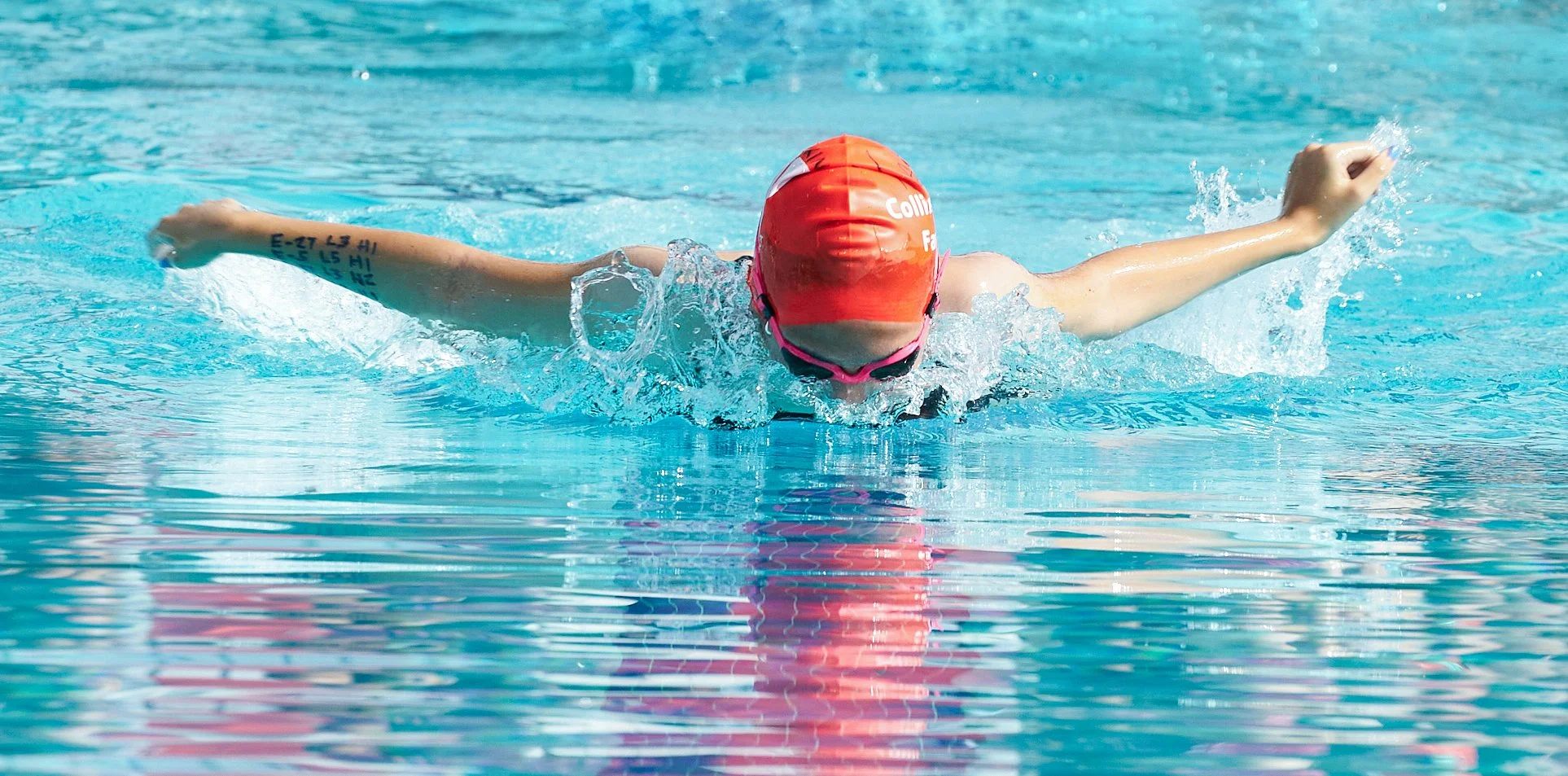 Swimmer competing at Collins & Katz Family YMCA swim meet sports photography shot by Los Angeles photographer Ken Sax.