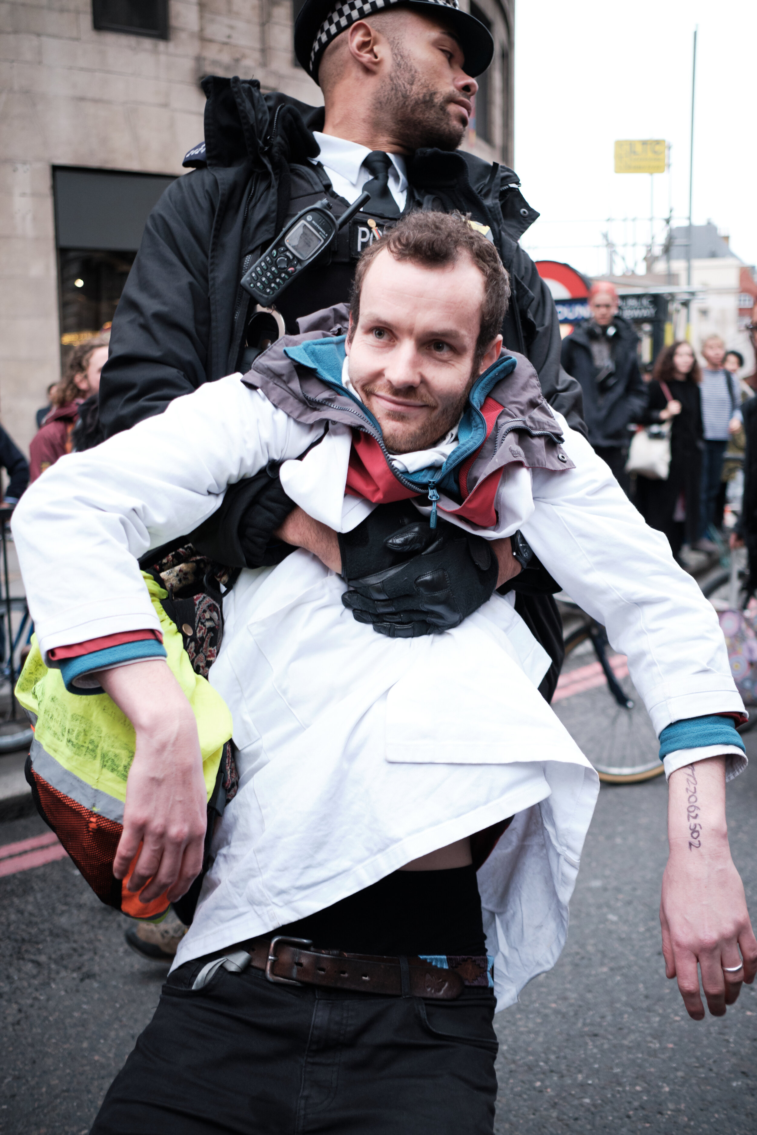  Scientists for Extinction Rebellion joined the City of London protests by closing the entrance road to London Bridge. They were quickly removed by police, but subsequently de-arrested because of the negative backlash arresting respected scientific p