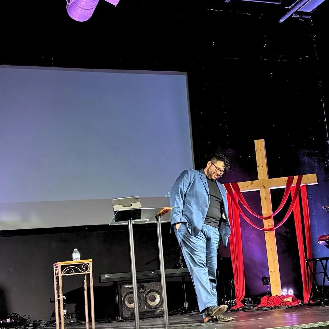 Pastor Mark Preaching blue suit.jpg