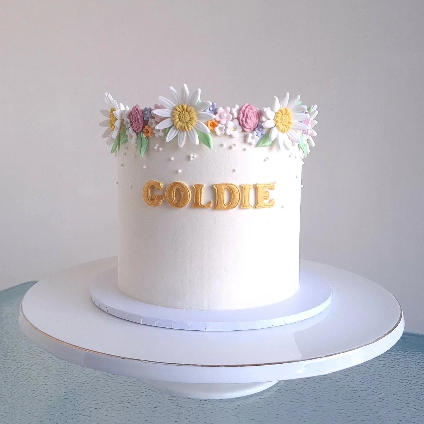 I think Goldies cake needed it's own spot on the grid 🌼💗
Happy 1st birthday!!!!

Inspiration picture supplied by customer.

#1stbirthdaycake #birthdaycakestaupo #taupocakes 
#cutecake