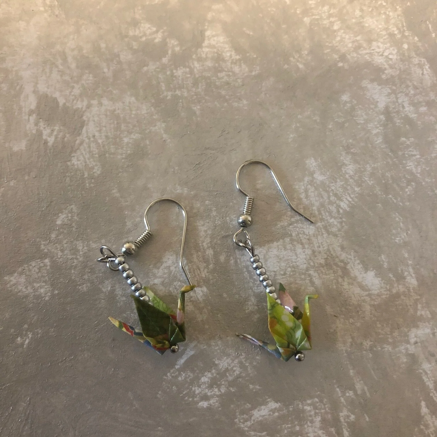 Green crane earrings.jpg