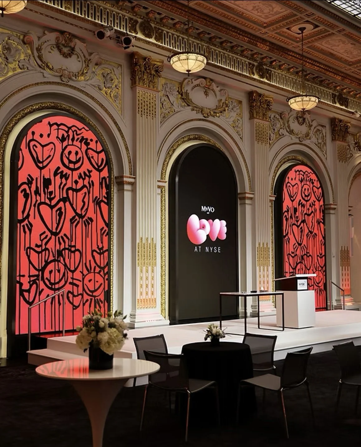 Visual artist, Miana, artwork featured on two large screens during The New York Stock Exchange closing bell reception