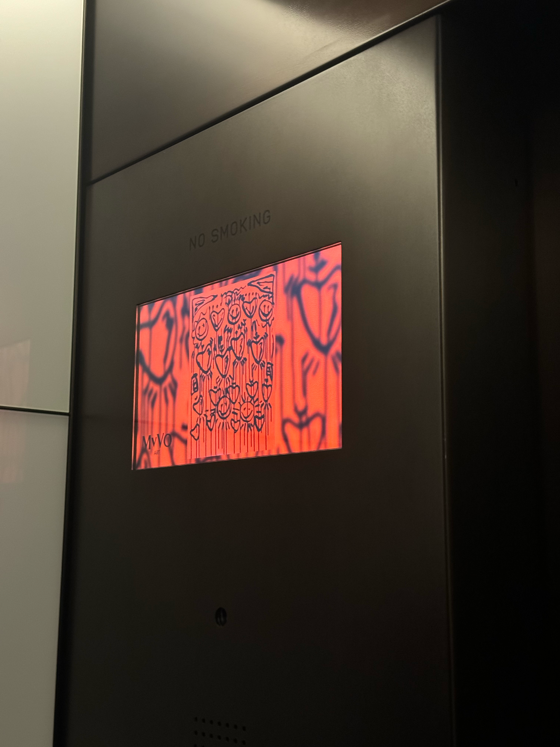 Visual artist, Miana, art featured in one of The New York Stock Exchange elevators
