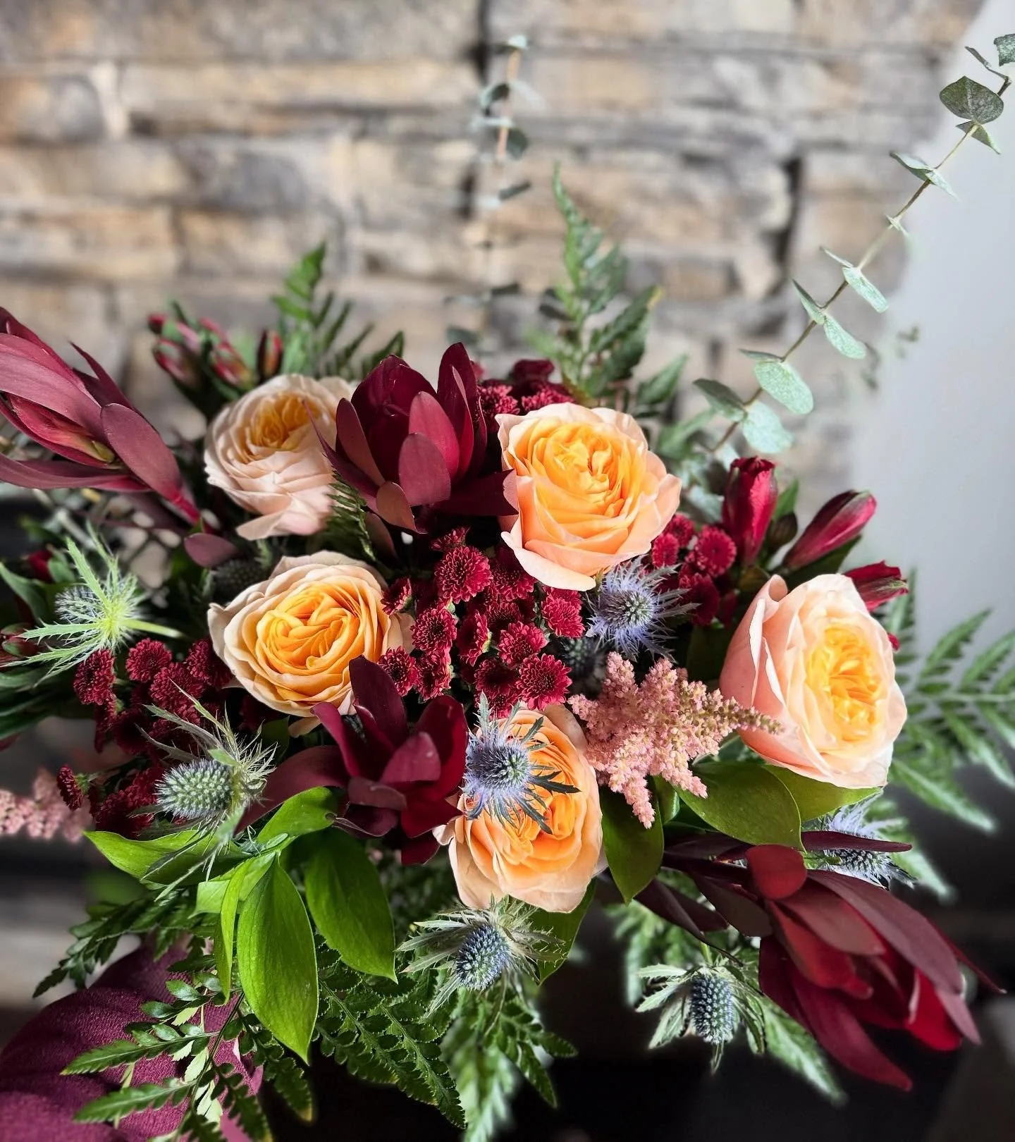 Custom bundle of the day! Love the combo of the peachy Kings Cross garden rose with shades of burgundy! 

If you&rsquo;re in the market for fresh flowers we have a couple  mason jar bundles available! Message us to claim yours! 

yegflowers #yegflowe