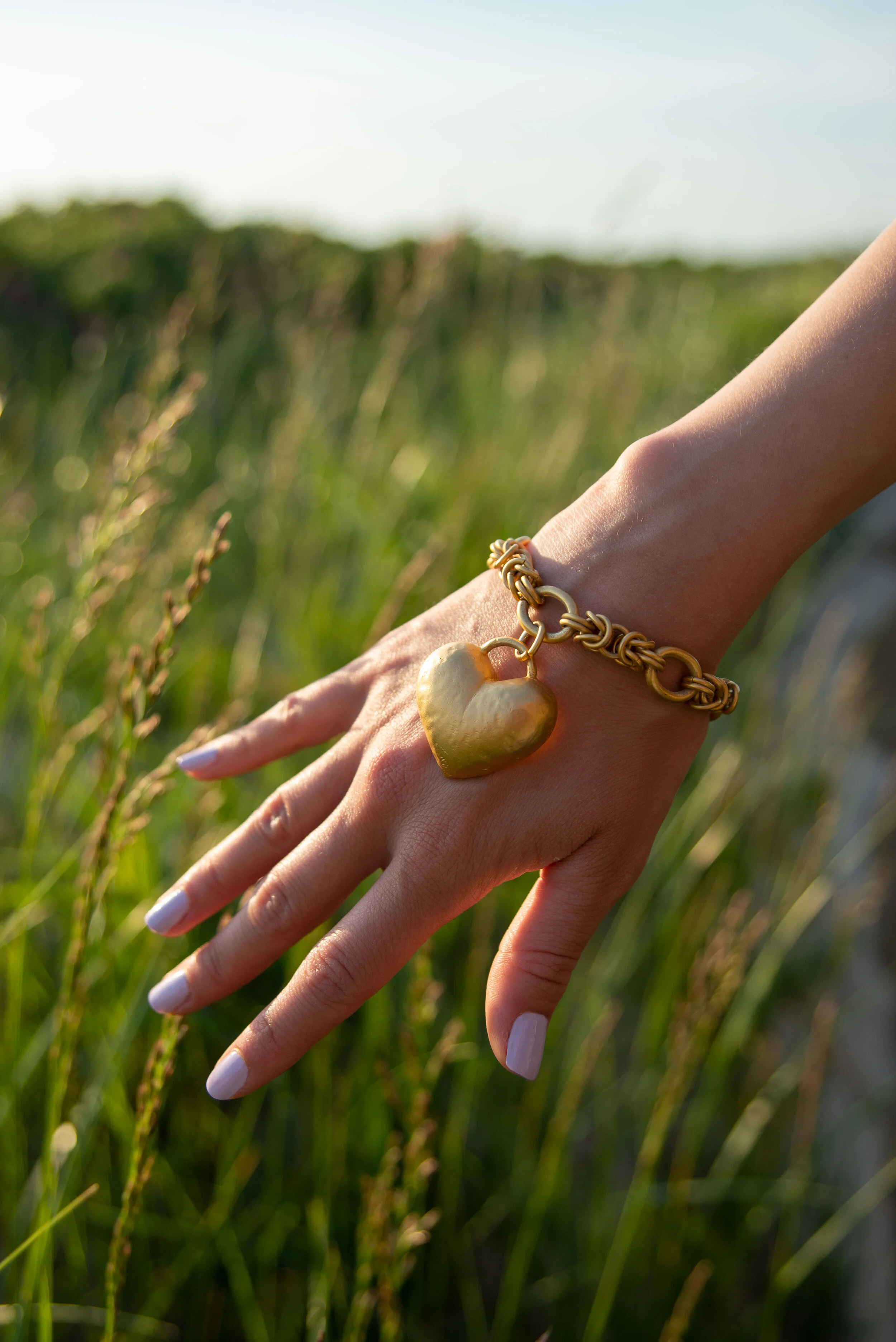 gold-heart-hand.jpg