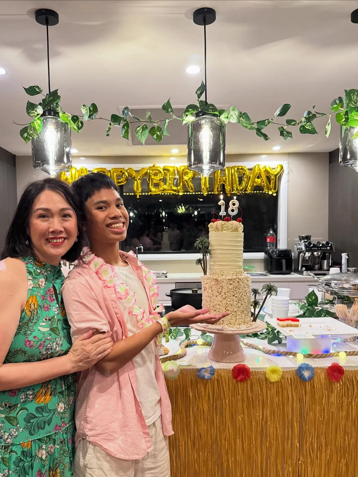 A &ldquo;cosy&rdquo; Hawaiian themed party for 90 to celebrate my youngest&rsquo;s 18th. With so many cake decoration ideas to choose from we kept it simple - the bottom layer covered in toasted coconut, the second layer topped with cherries, and dec