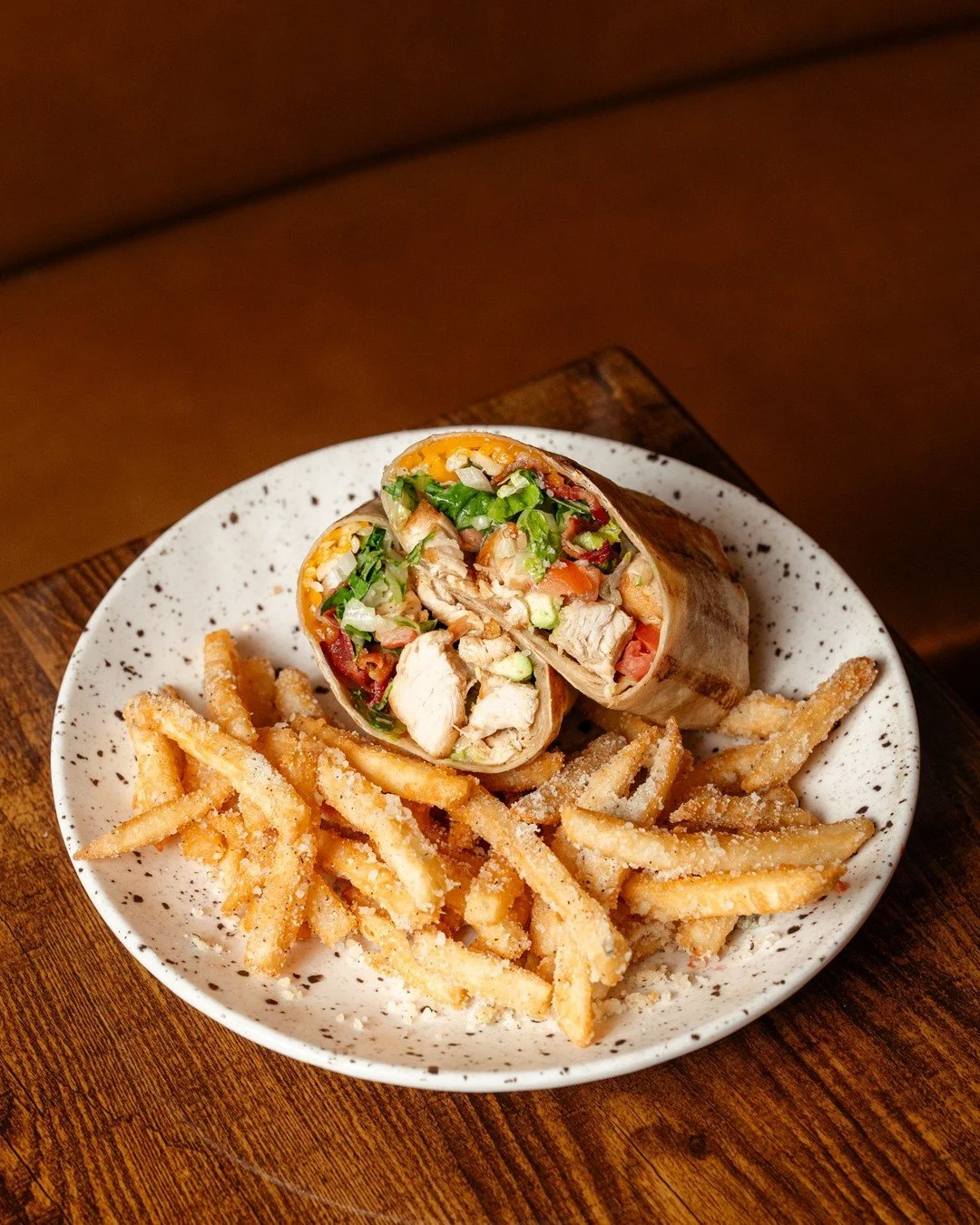 Good food, familiar faces, and your favorite wrap waiting for you 🤍
Johnny&rsquo;s Chicken Wrap... just how you like it, every time!