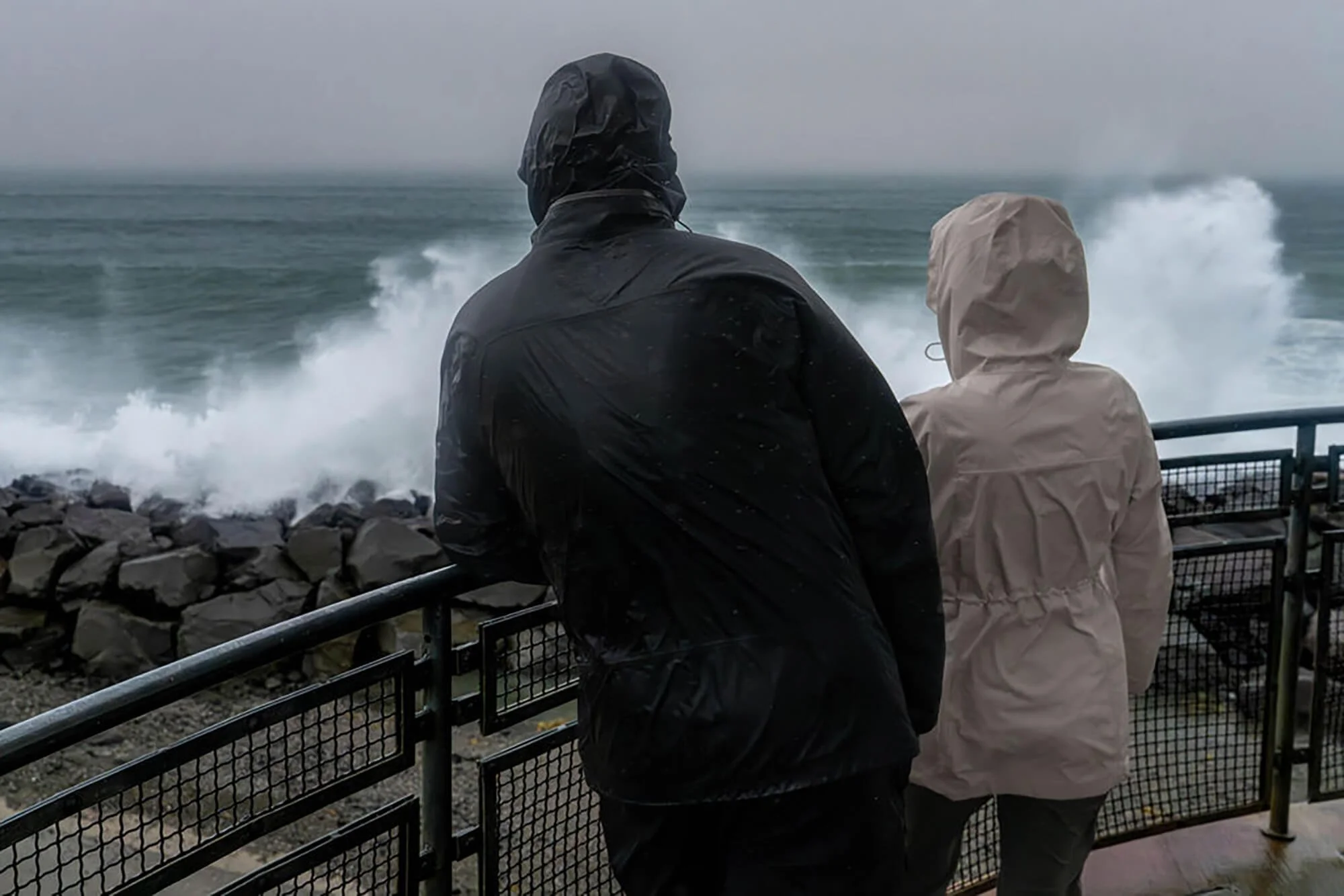 watching storm waves from base of viewing tower
