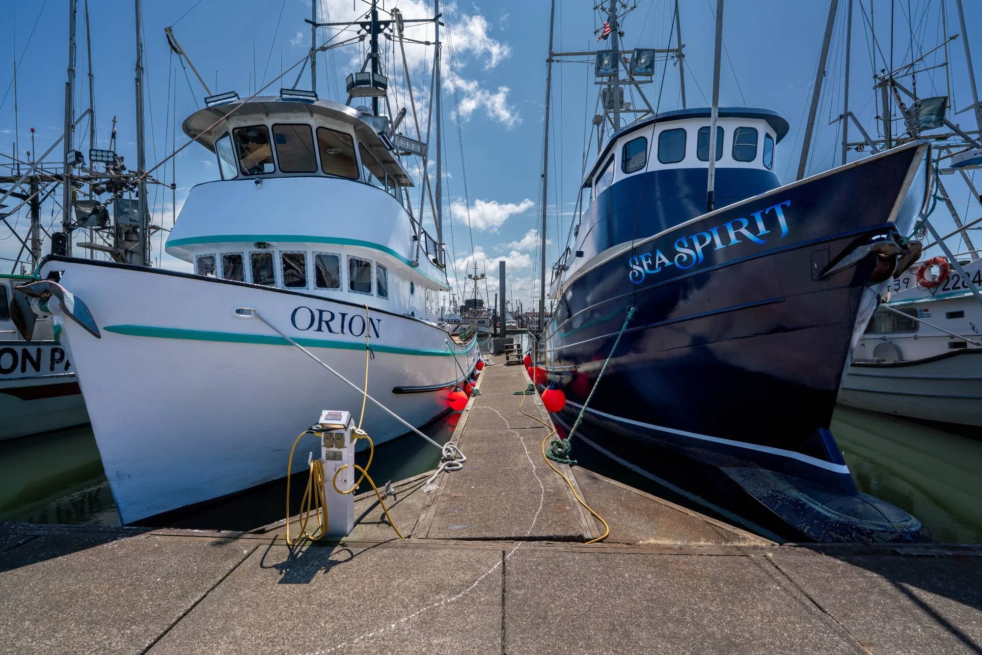 Orion and Sea Spirit fishing boats docked in harbor