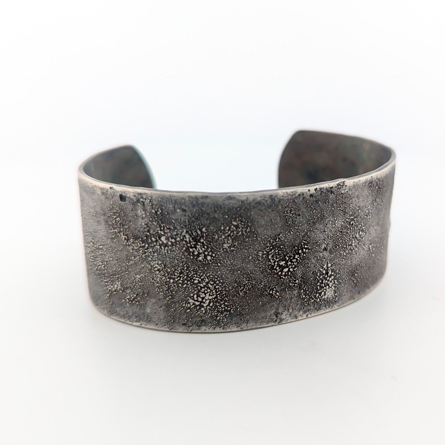 Most people know that I'm a total texture junkie! I love the way metal moves and can emulate other things we love in this life. When I fuse sterling silver dust on top of silver, it reminds me of the surface of the moon, much like this &quot;moondust