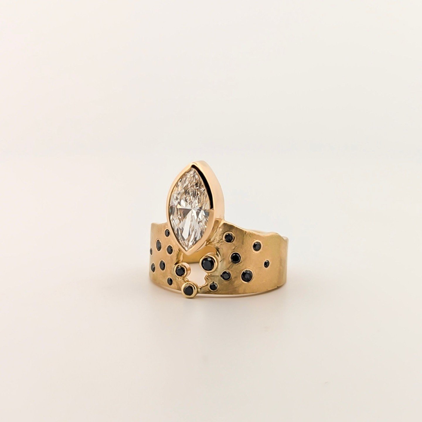 Congrats to Tess and Nick on their recent engagement! ✨️⁠
⁠
What a fun, unique custom design and joy to secretly hand off the ring. We can't wait to work on wedding bands with this couple and make a beautiful set later on.