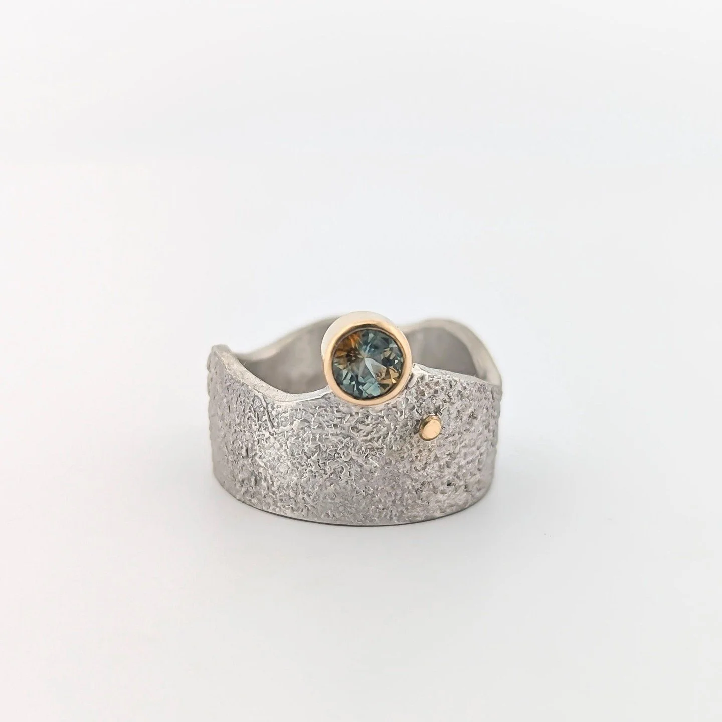 Bicolor sapphires are so otherworldly when they hit the light! It was so special to pick out this stone for a custom project at the Tucson gemstone show for a client. Drop us a message through our website if you'd like to create a custom with us and 