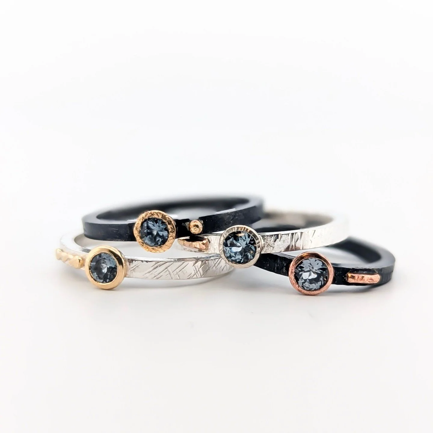 Spinels are dreamy and each facet in these gorgeous stones evoke the cosmos! Which gold setting is your favorite?