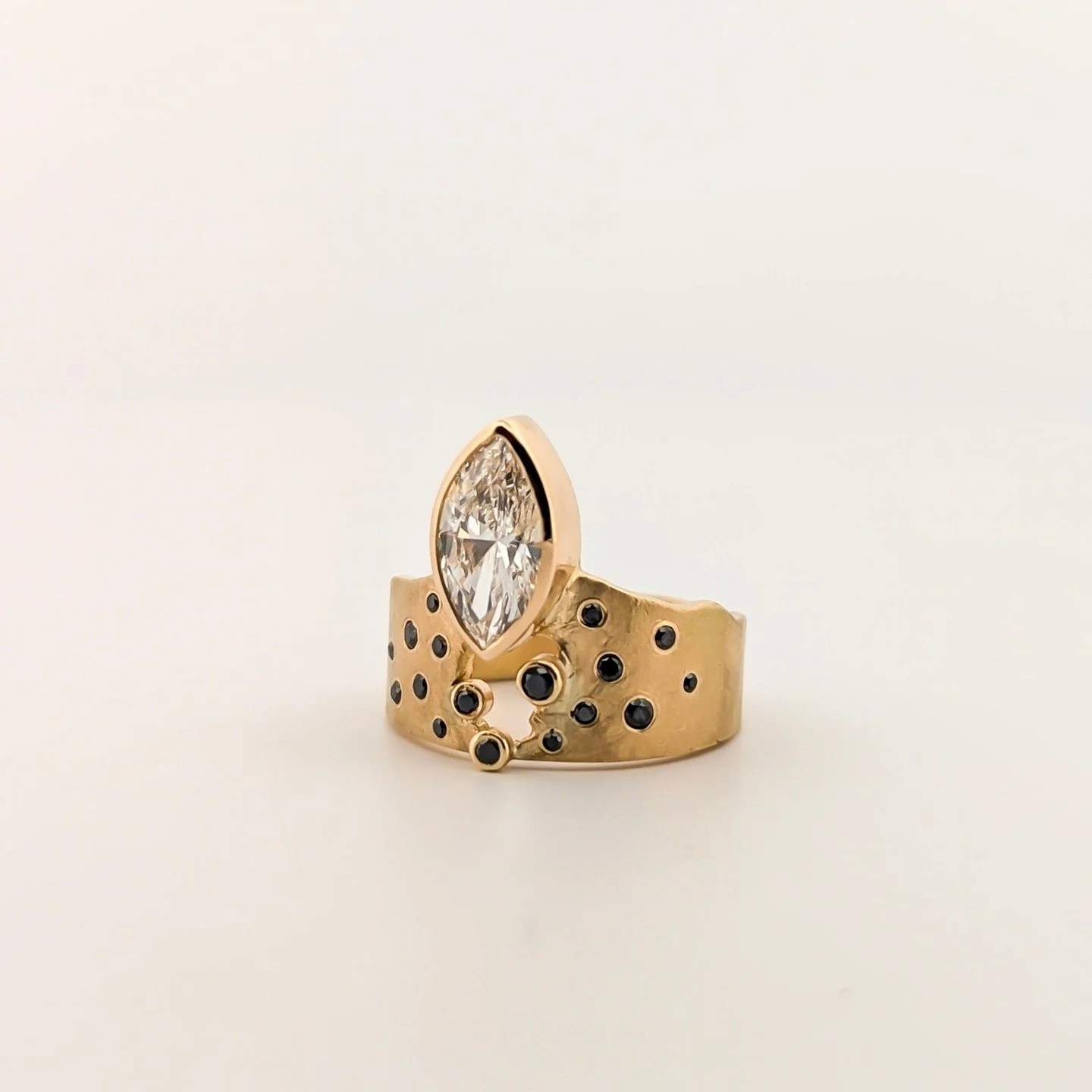 Congrats to Tess and Nick on their recent engagement! ✨️⁠
⁠
What a fun, unique custom design and joy to secretly hand off the ring. We can't wait to work on wedding bands with this couple and make a beautiful set later on.