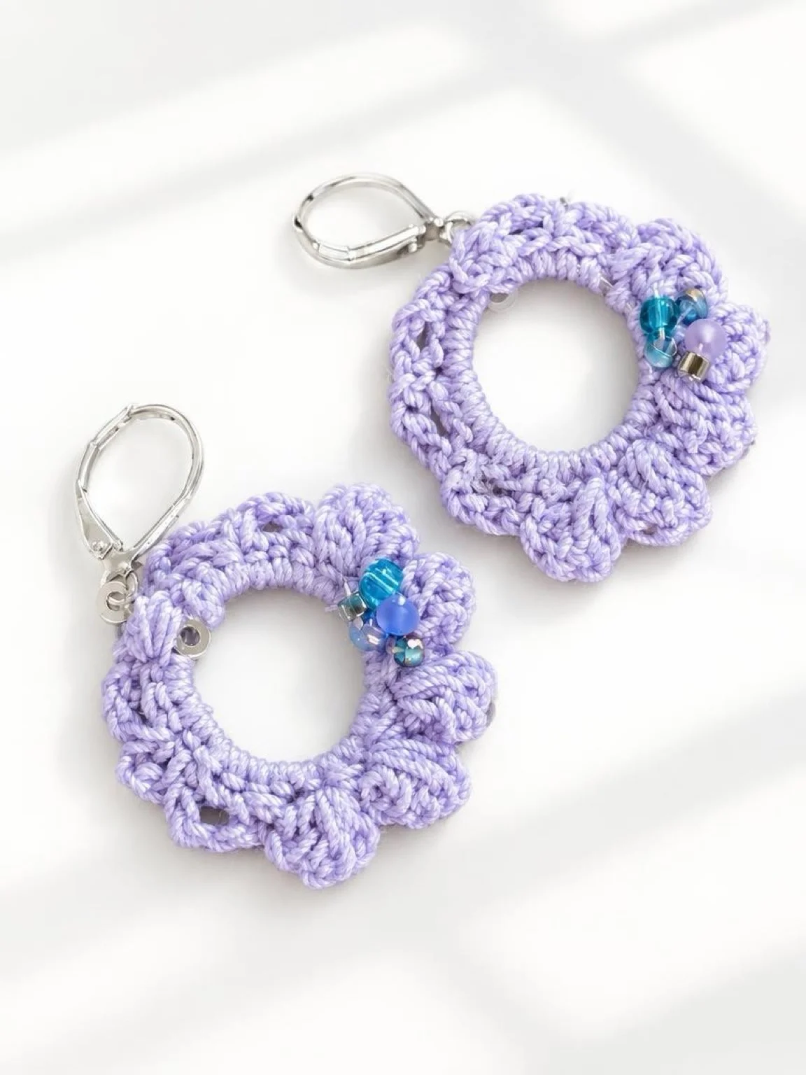 Purple beaded dangle earrings