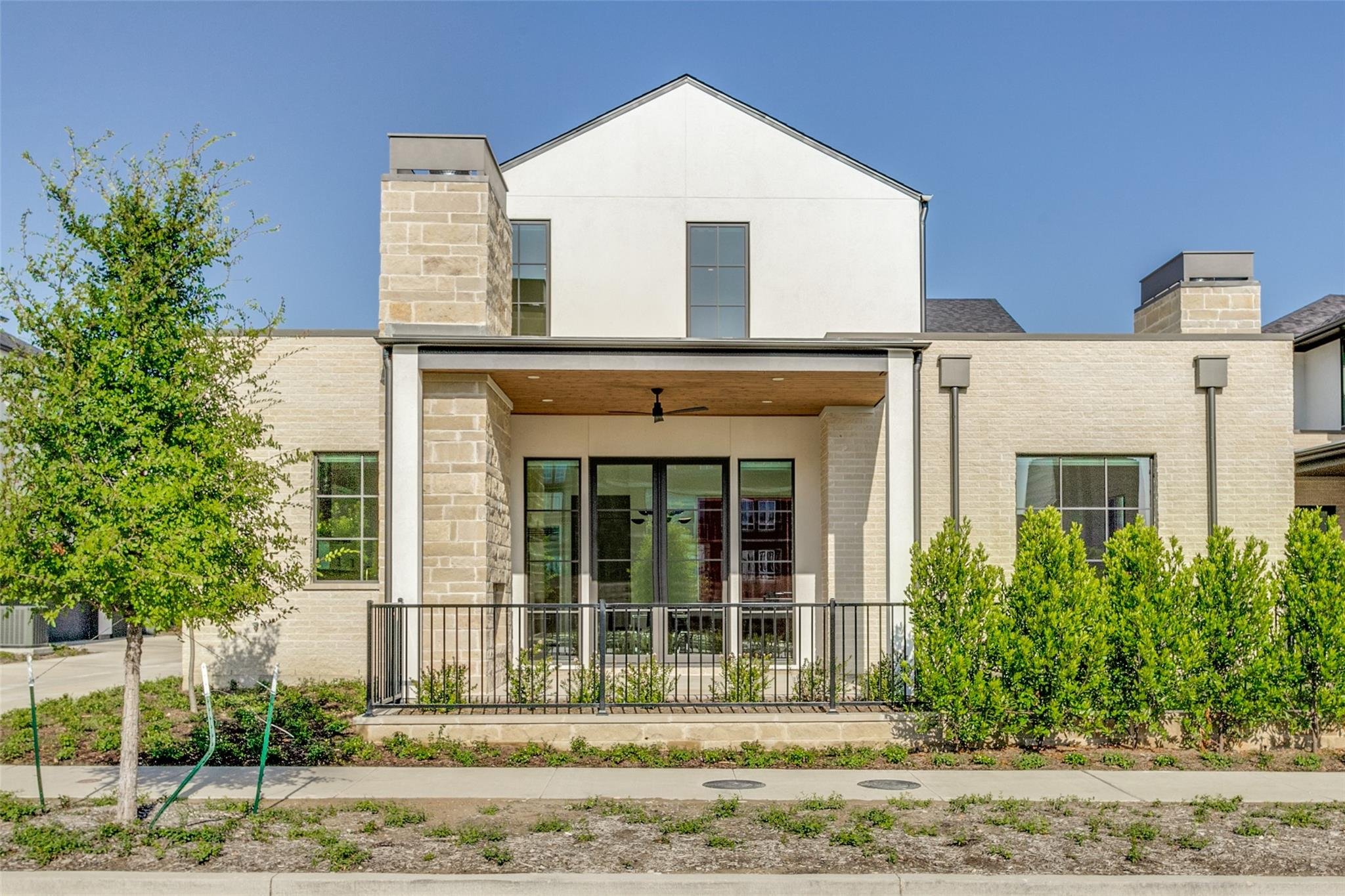 Lincoln Windows &amp; Iron Front Door (Exterior Color- Bronze, Interior- Painted)