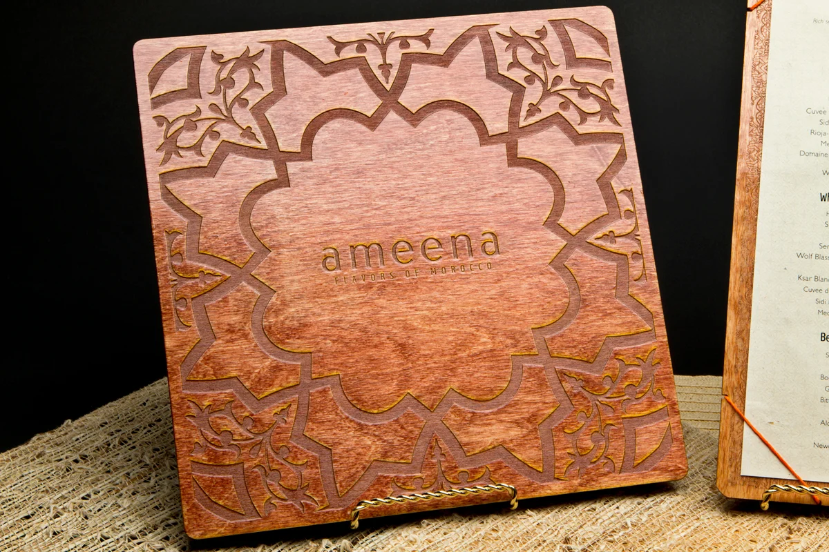 Wood carving details on the back of dinner menu.