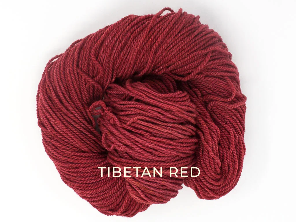 skein of merino wool finger weight in tibetan red