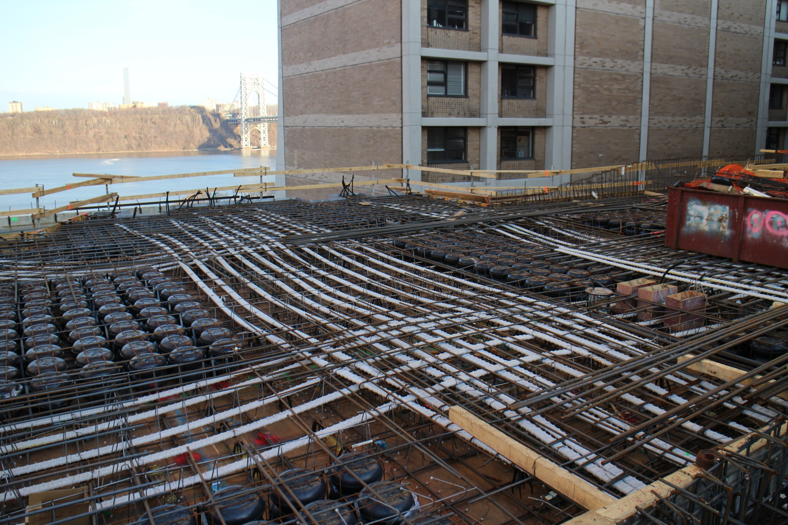 Seriously Accommodating — This use of voided concrete slabs in combination with post-tensioning controlled deflections efficiently. Concrete voids rarely occupy space in isolation, including the stacked voids used in this slab solution. CobiaxUSA provided voids are engineered to work in harmony with MEP systems, post-tension strands, inserts and more.
