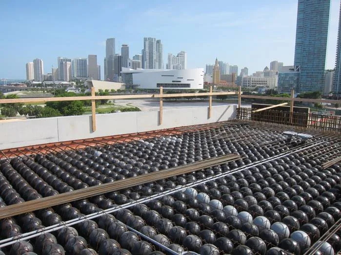 Removing Weight While Increasing Spans — Engineers at Arup USA found this void system, used in a variety of slab thicknesses and configurations on the project, to be an efficient solution to several design challenges.