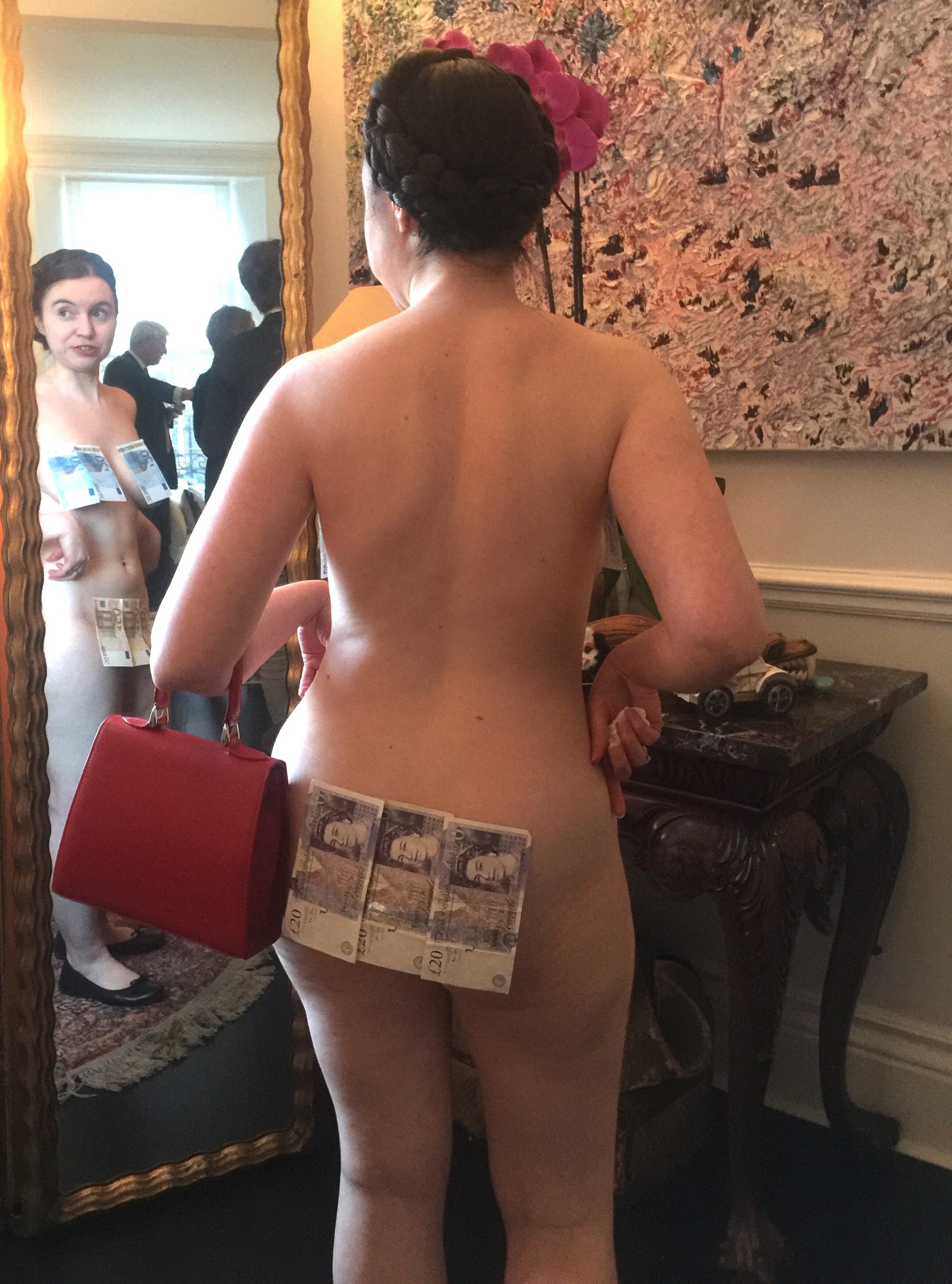 Victoria Bateman at an event wearing only banknotes