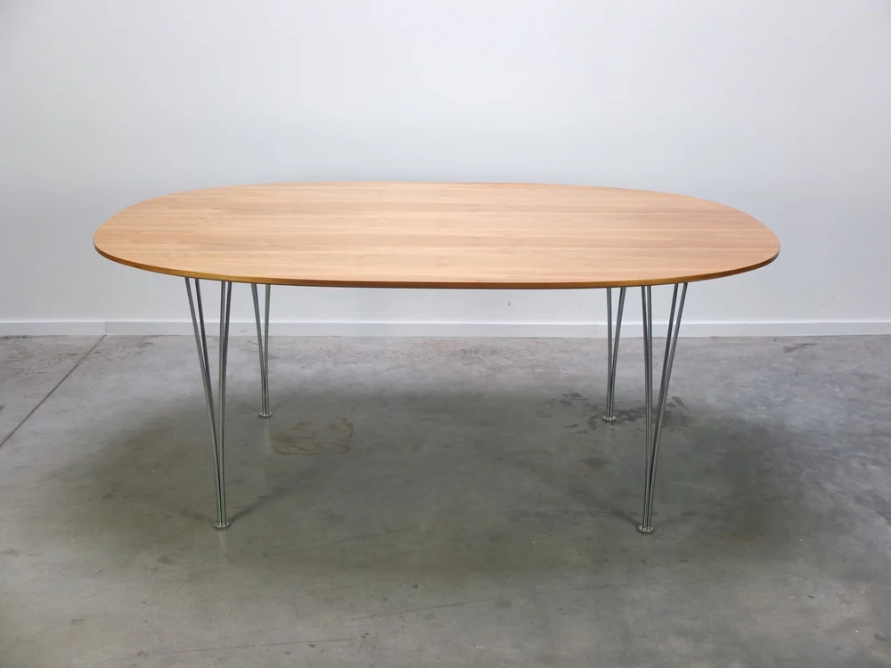 WALNUT 'SUPERELLIPSE' DINING TABLE BY PIET HEIN & BRUNO