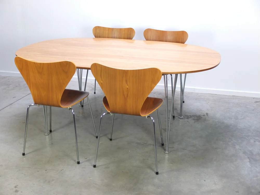 WALNUT 'SUPERELLIPSE' DINING TABLE BY PIET HEIN & BRUNO