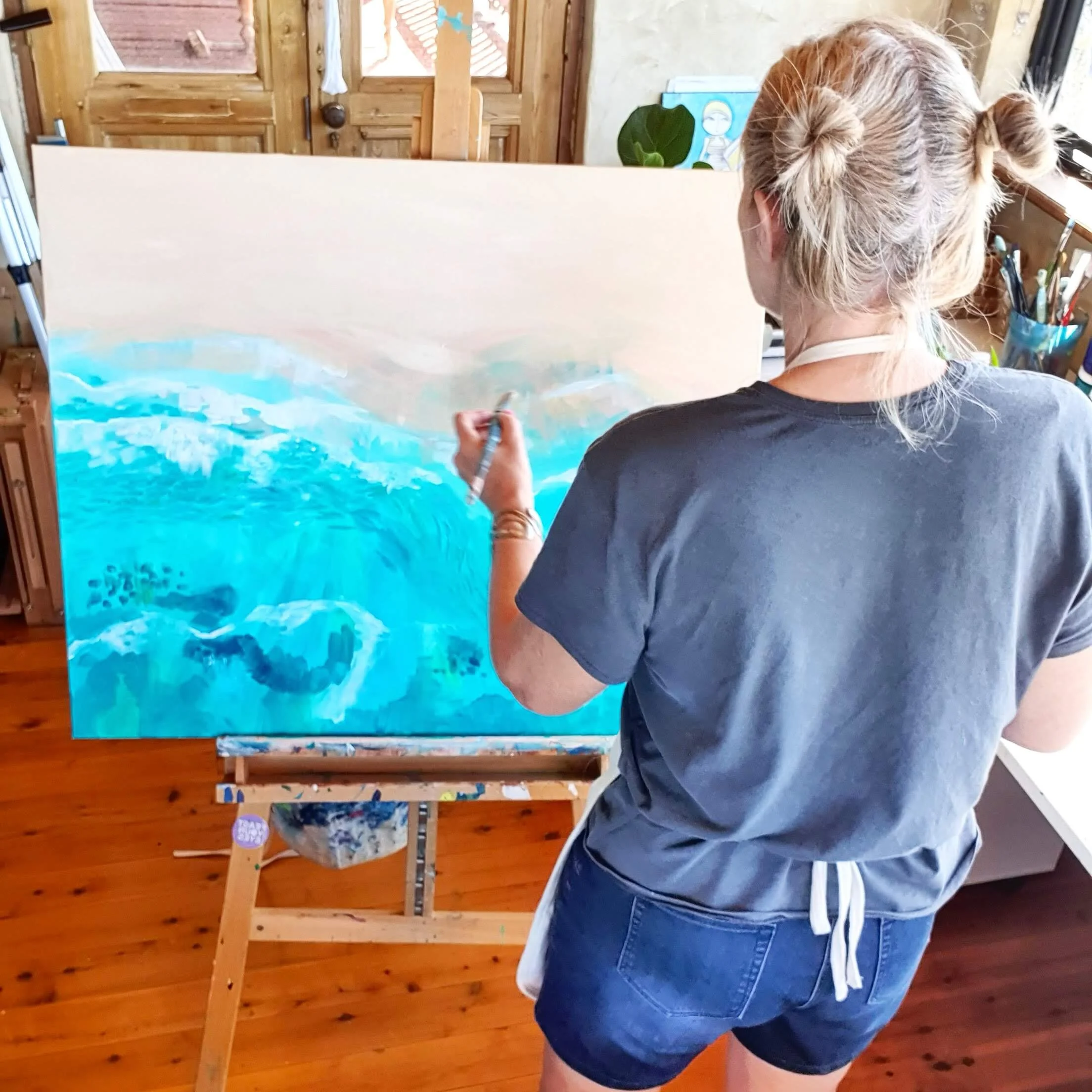 Sandy in the studio painting