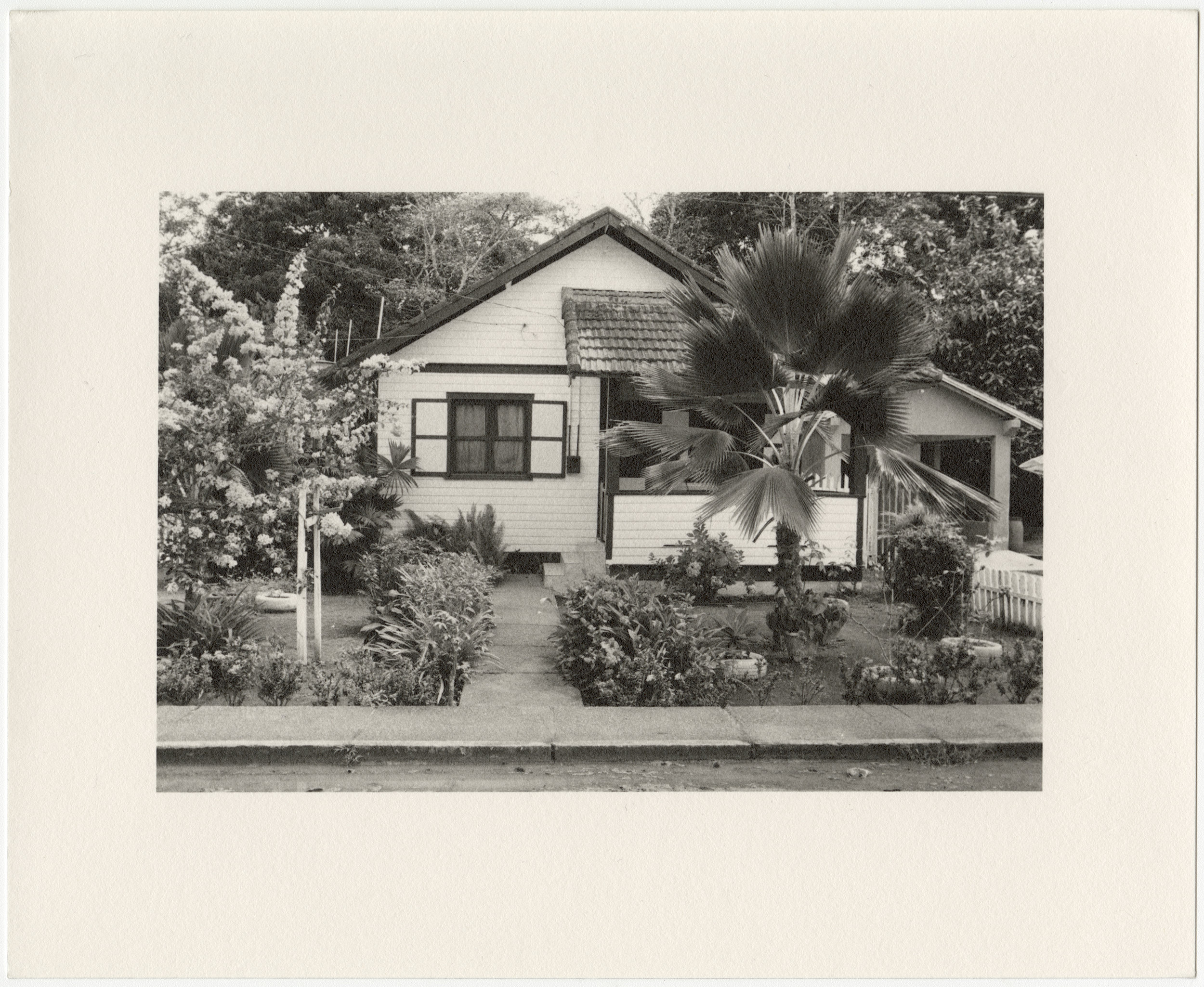  Belterra employee house with palm tree, built in 1934 by the Companhia Ford Industrial Do Brasil Ford Motor Company. 2014 Belterra, Pará, Brazil. Gelatin silver fiber print, 8” x 10”, 2018 