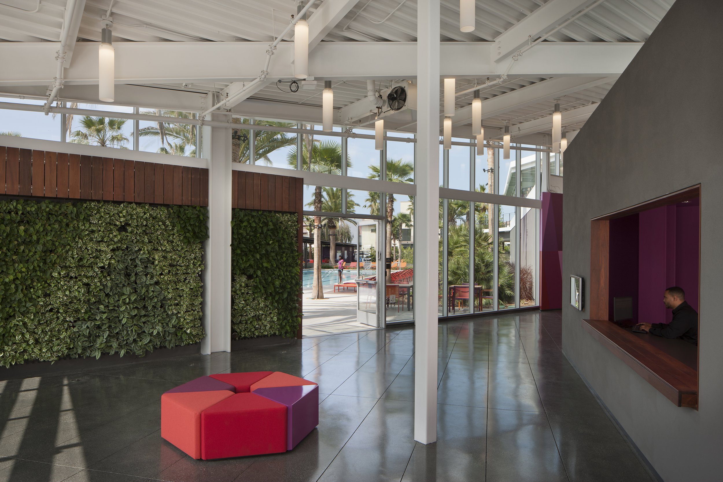The-Resort-Community-Center-Open-Air-Lobby-Pool-Colorful-Furniture.jpg