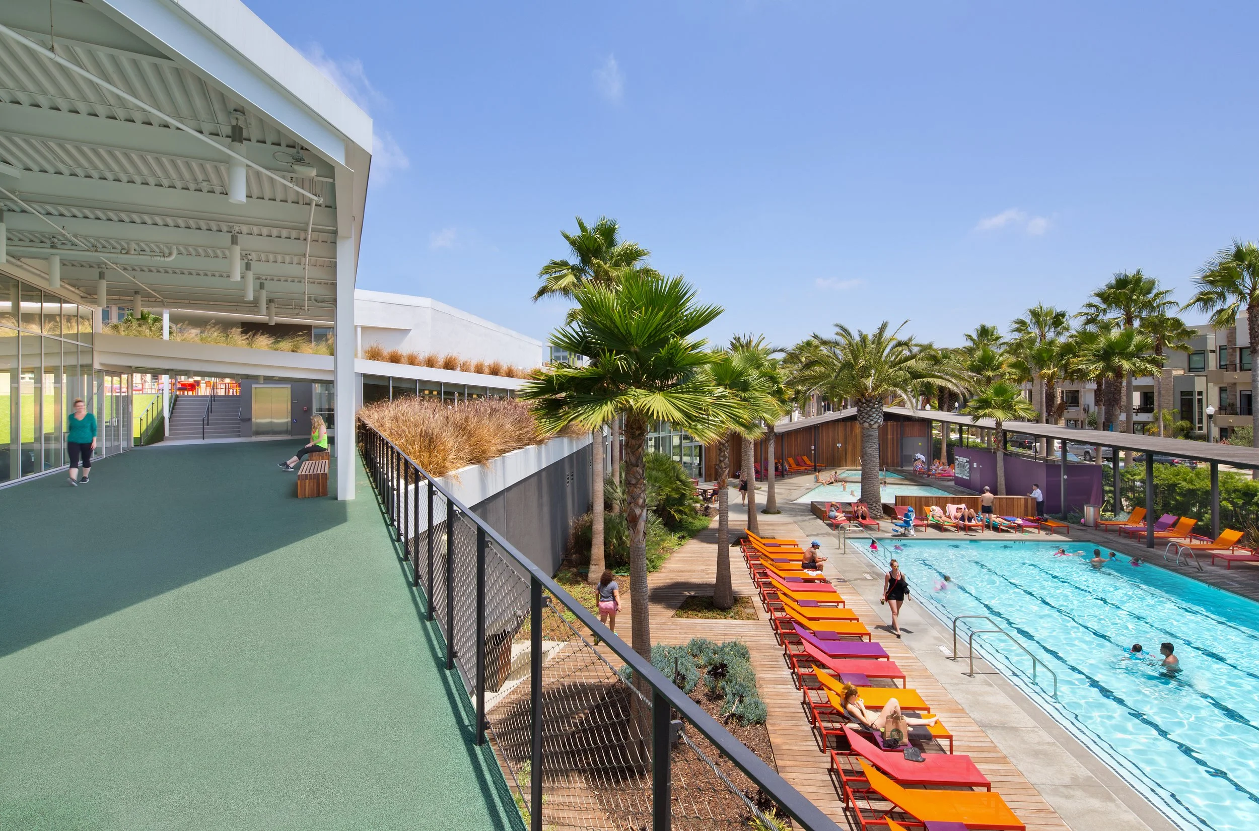 The-Resort-Community-Center-Pool-Exercise-Deck-Colorful-Chaise-Lounges.jpg