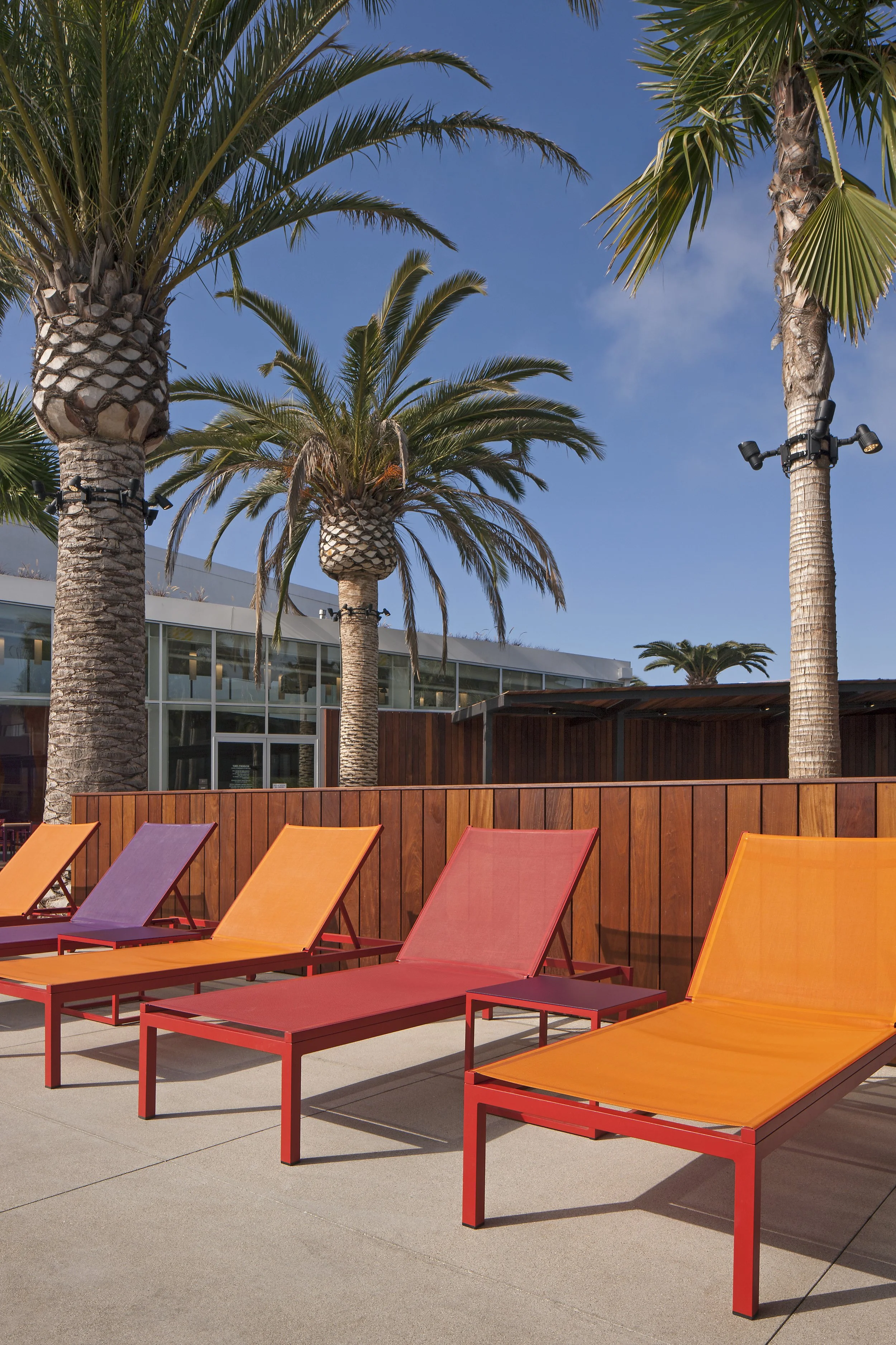 The-Resort-Community-Center-Pool-Deck-Colorful-Chaise-Lounge-Kettal.jpg