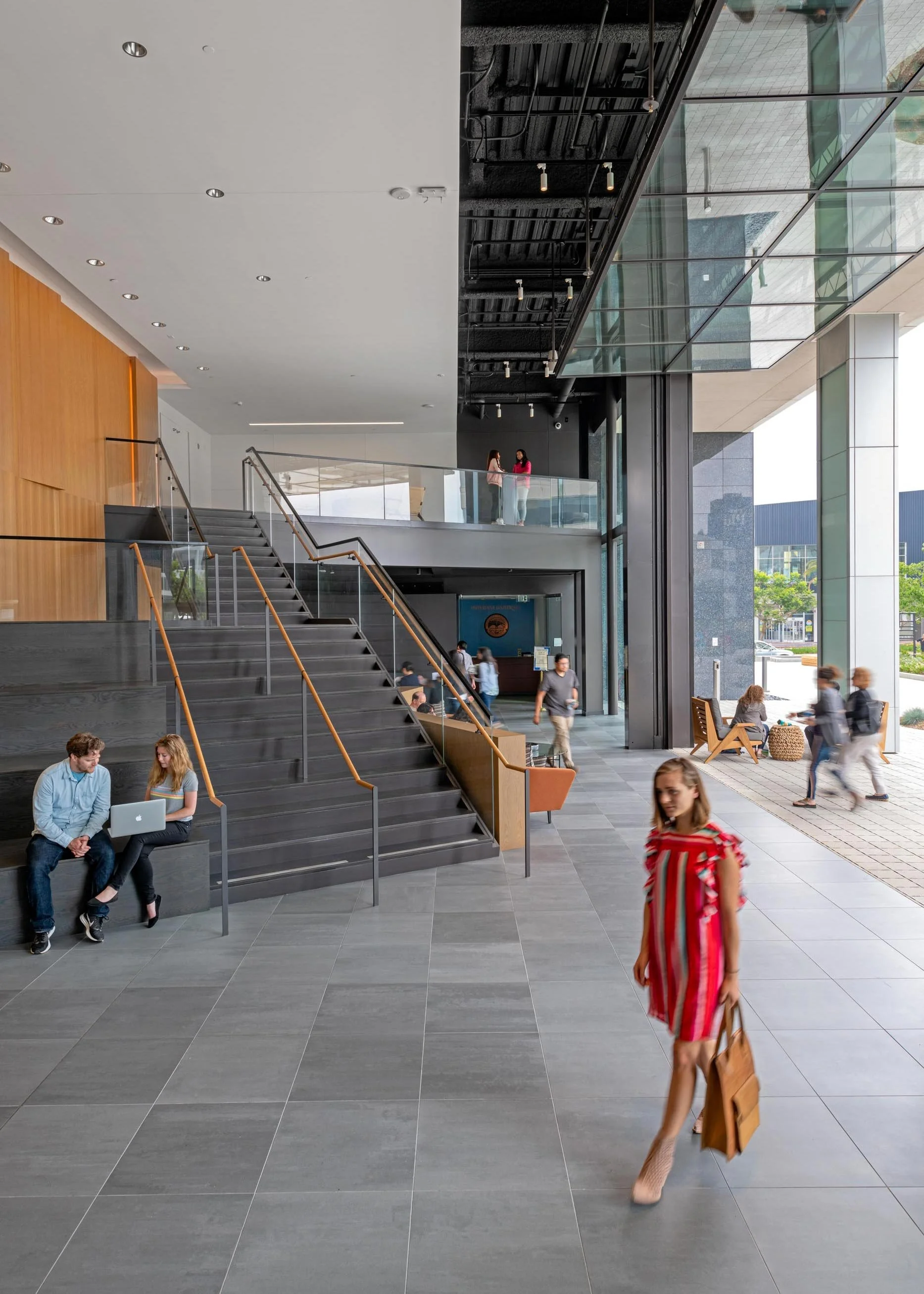 PlayaDistrict-Lobby-Hospitality-Lounge-Stair.jpg