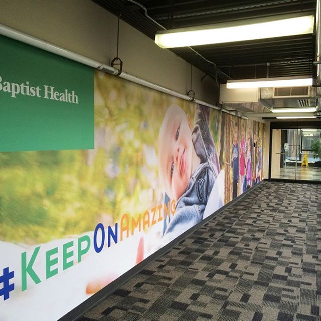 Wall graphics can turn an ordinary hallway into something amazing!! We printed and installed this graphic to help @baptisthealthar #KeepOnAmazing, reinforce their brand and beautify their campus. Send us a DM to find out more ways to transform your s