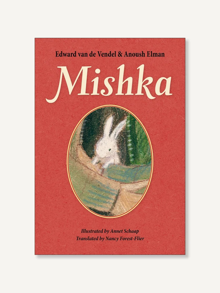 cover of children's novel Mishka, red with an oval portrait of a small white rabbit snuggled against a human whose unzipped jacket keeps it warm