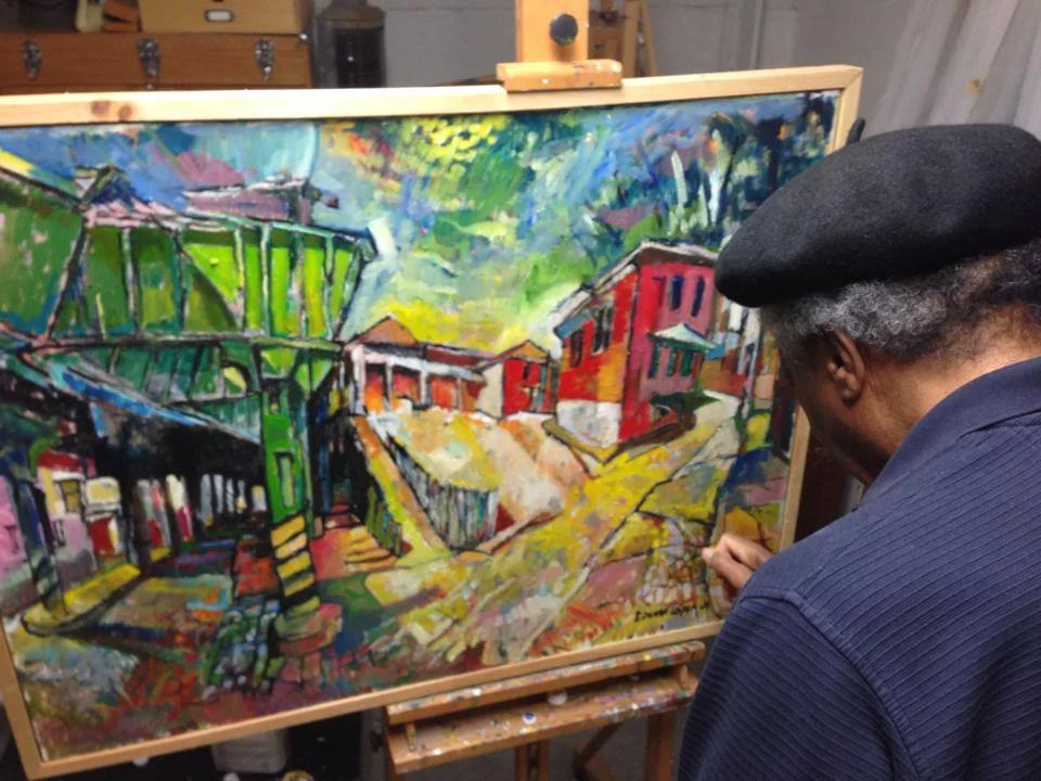 Edward Loper Jr adding more perspective to another Manyunk piece in his home.