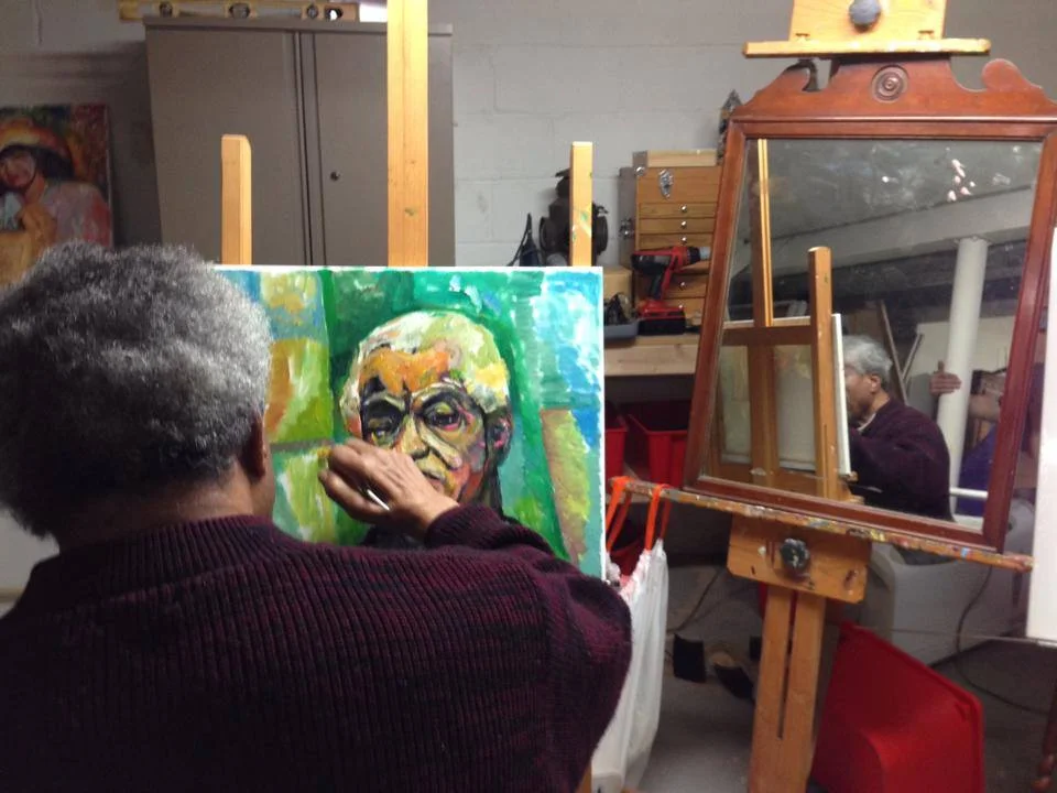 Edward begins work on a self portrait in his studio.