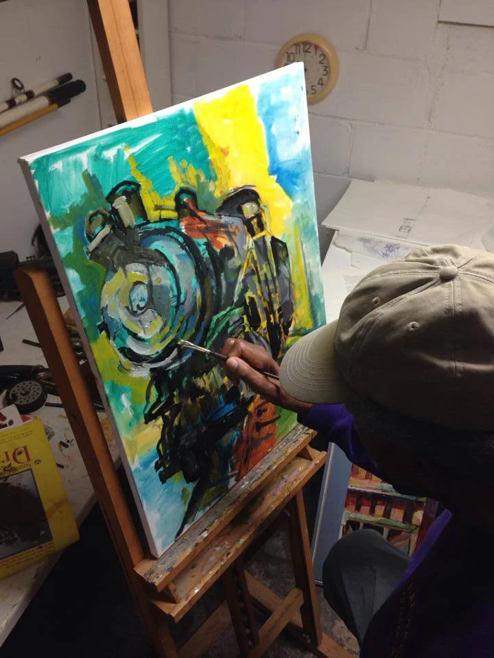 Edward Loper begins layering paint to his his newest creation.
