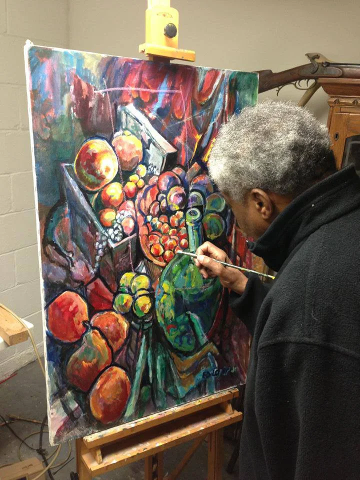 Edward working on a still life piece in his Wilmington studio.