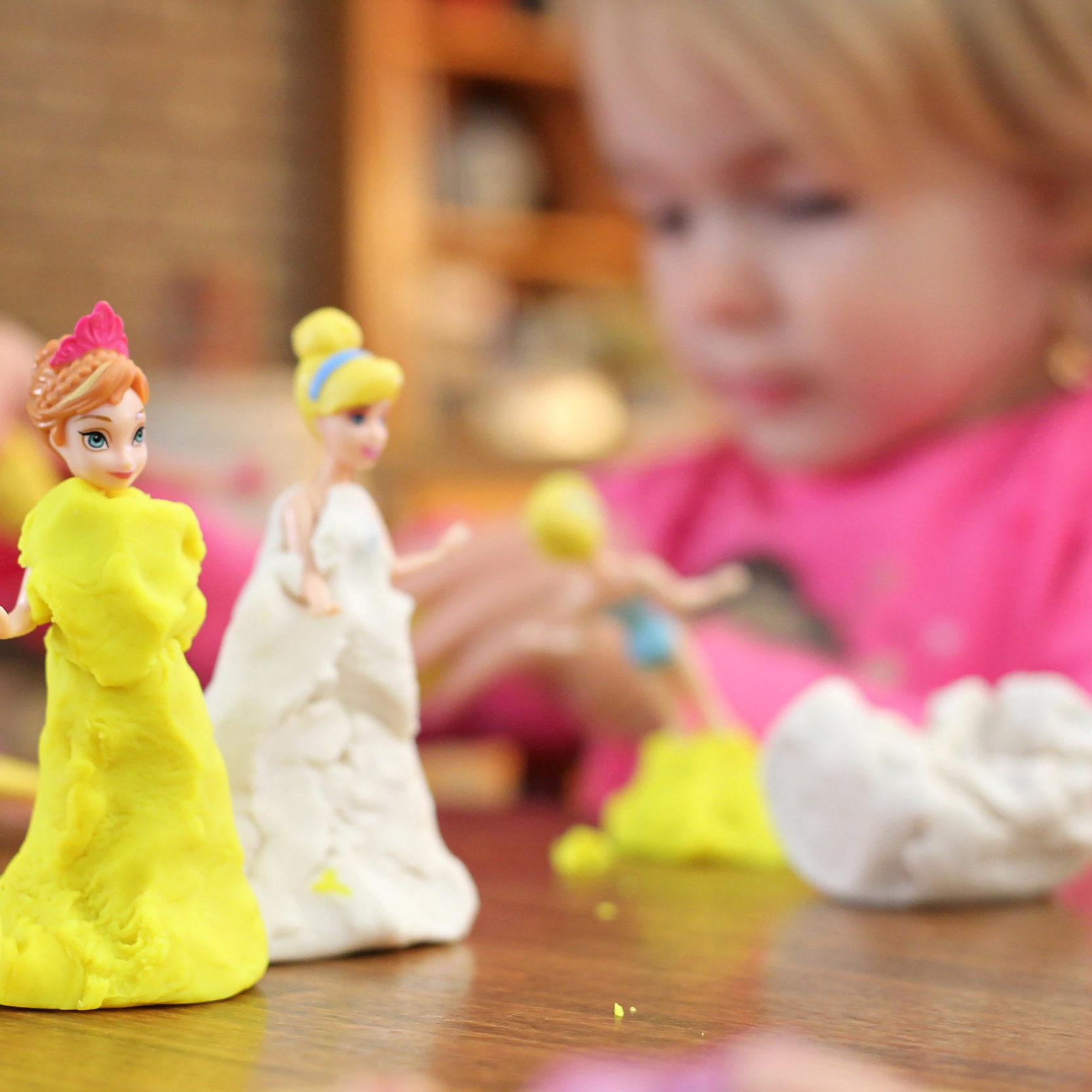 Canva+-+Selective+Focus+Photography+of+Three+Disney+Princesses+Figurines+on+Brown+Surface.jpg