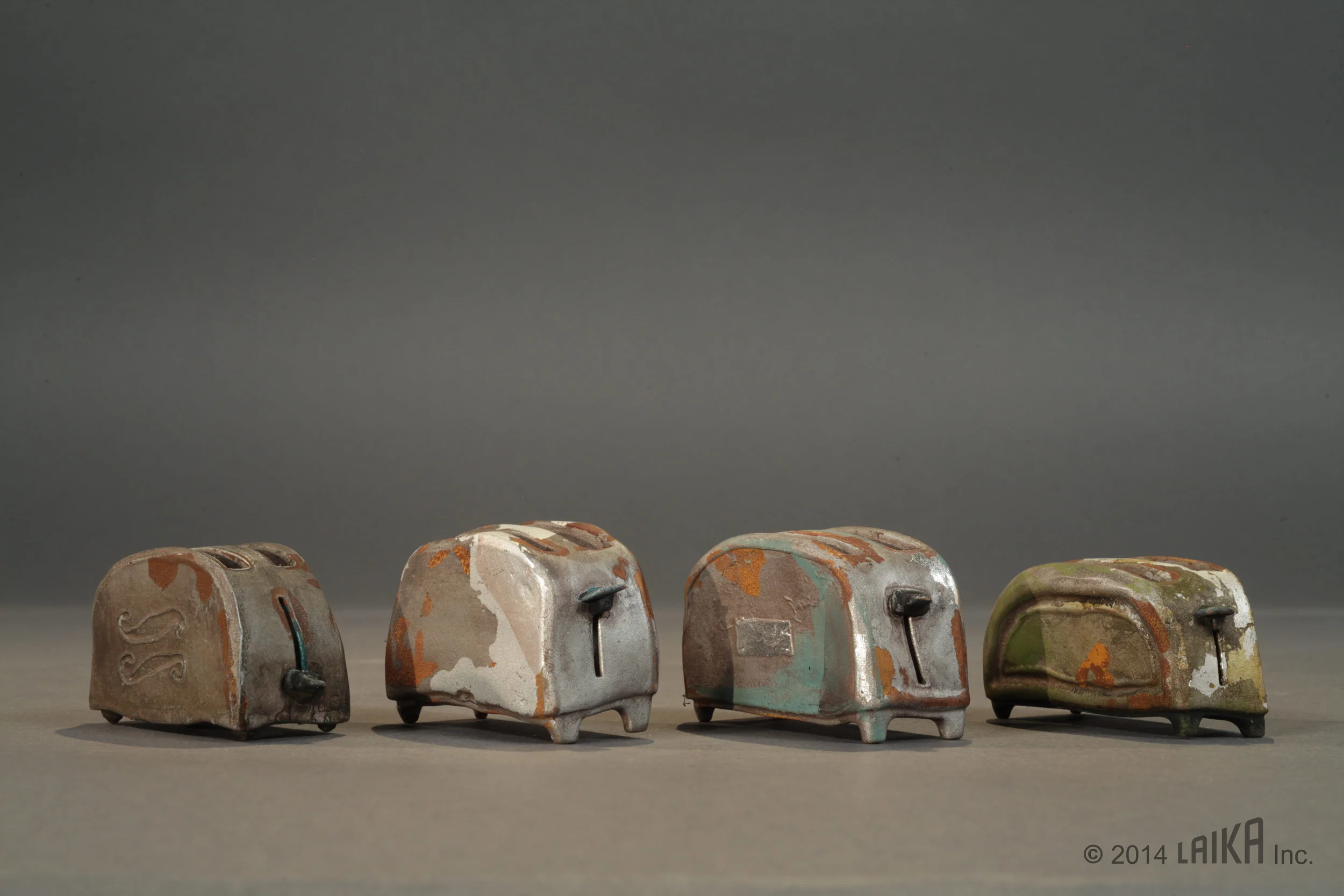 0010.box_cavern.intboxtrollcaverndamagedupe.pile_of_toasters_parts.turnaround.tchen.jpg