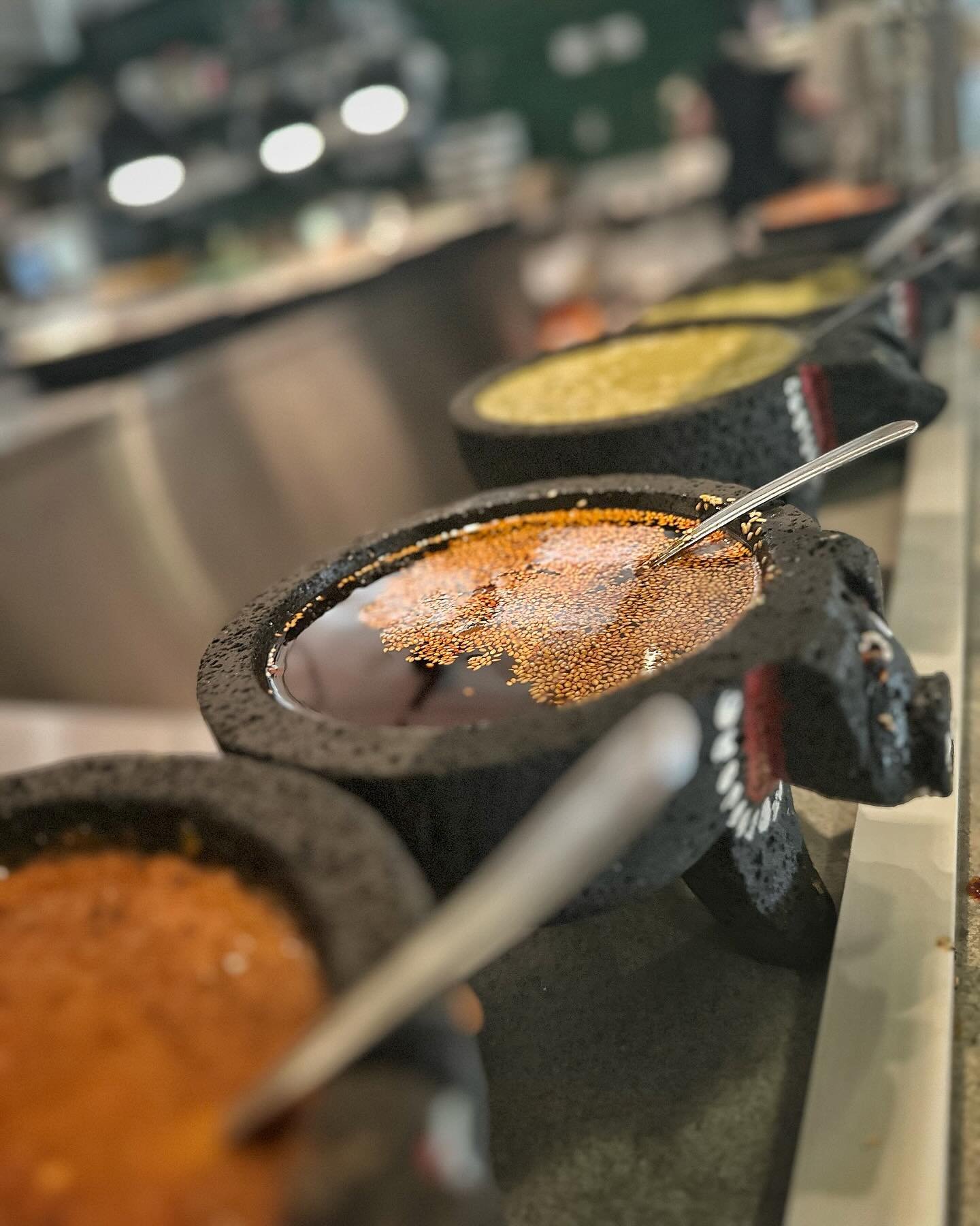 Our salsa bar is always full of delicious flavors, spices &amp; levels of heat, as you would find in a traditional taqueria in Mexico. You can usually find our salsa macha, tatemada, verde, roja, charred pineapple, escabeches &amp; more! Once you rec